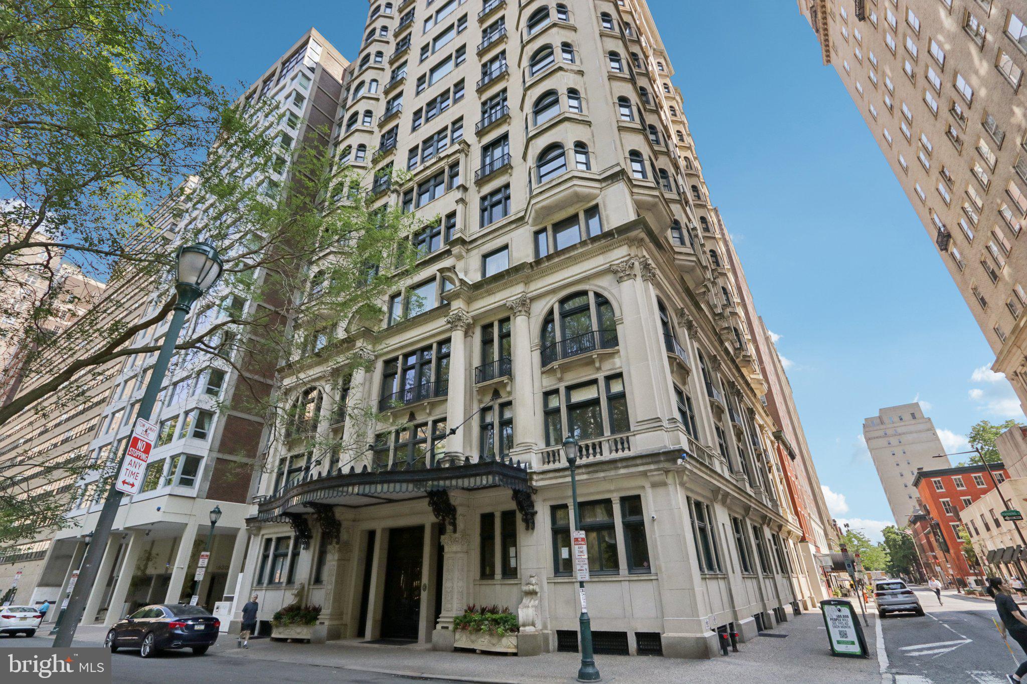How do you know you’ve arrived? You’d live in one of Philadelphia’s most elegant buildings, situated on Rittenhouse Square Park without having to compromise your desire for an abundance of beautiful living space.
To create this opportunity, 2 separate units have been enjoined to create the 2,200+ stunning square foot living space in this exquisite and iconic Beaux Arts style building. This architectural masterpiece features intricate stone carvings, balustrades, Juliet balconies, arched windows, ornate iron work and the crown jewel, the iconic glass and iron marquis and doors. This is where impeccable service begins.  From the moment you approach,  the door is opened for you and the staff stands ready to assist with packages. As you walk through the grand lobby, enveloped by coffered and gilded ceilings, Tiffany chandeliers, and marble floors the elevator operator greets you and ushers you to your floor. 
The elegant foyer with gleaming marble floors and intricate millwork greet you and leads you into your expansive space as sunlight pours through large windows and Juliet balconies, highlighting the soaring 10' ceilings, crown molding and parquet floors.
The Open Dining / Living Room features  wonderful wide-open space with built in bookcases and recessed lighting. The Dining Area feat. the perfect niche created by a bay of windows for you and your dining guests to enjoy a meal prepared in your adjacent, classic black and white tiled Kitchen feat. a gas Thermador Range, Carrera marble countertops, plenty of cabinetry, and closets too! The exquisite Main Bedroom features two full bay window alcoves, prefect for seating, dressing or just enjoying the view. A walk-in closet and a classic Ensuite Main Bath with wall-to-wall glass shower, vanity with marble top and designer lighting make this truly a suite. The Study/ 2nd Bedroom features 2 closets, amazing views and light captured by the oversized windows and doors including a Juliette balcony.  
The second full bathroom feat. tiled floor, tub shower and pedestal sink. 
The Family Room, located at the corner of the building features more amazing views from the wall of windows, a sitting area, an open gathering area, Juliette balcony, and ample built in custom shelving. The Craft Room/Laundry Room. Here you will find open space with a beautiful free standing porcelain sink, built ins and the washer and dryer. This space could potentially be additional small kitchen or full bath to service the current Family Room, or as part of a suite for an au Pair, caregiver, boomerang child or parent There’s even a separate entrance door from the foyer that could be utilized for more privacy, should you wish for this to become separate living quarters.
These spaces are designed to function for however you decide whether it be elegant entertaining, working from home, a more informal retreat or working on your next project in the craft room. 
There are amenities too, including a Gym, Bike Room and a full-service Mail Room. The staff will collect your mail and packages and deliver them to your door and will even send you a text message to let you know your package arrived! Just outside the front door is the lovely Rittenhouse Square Park where Black-Tie galas, art shows, picnics, children playing and dog walking are a common site. Fine and casual dining, coffee bars, the new Equinox gym and plenty of boutique shops are just outside your front door. When you’ve finished your day, you can come home where the doorman is waiting to greet you, its “library” quiet and ascend to your quiet oasis, high above it all. Yes, you have arrived.


 An allowance  for 1 year of parking to be given to the buyer from the seller with an acceptable agreement of sale.