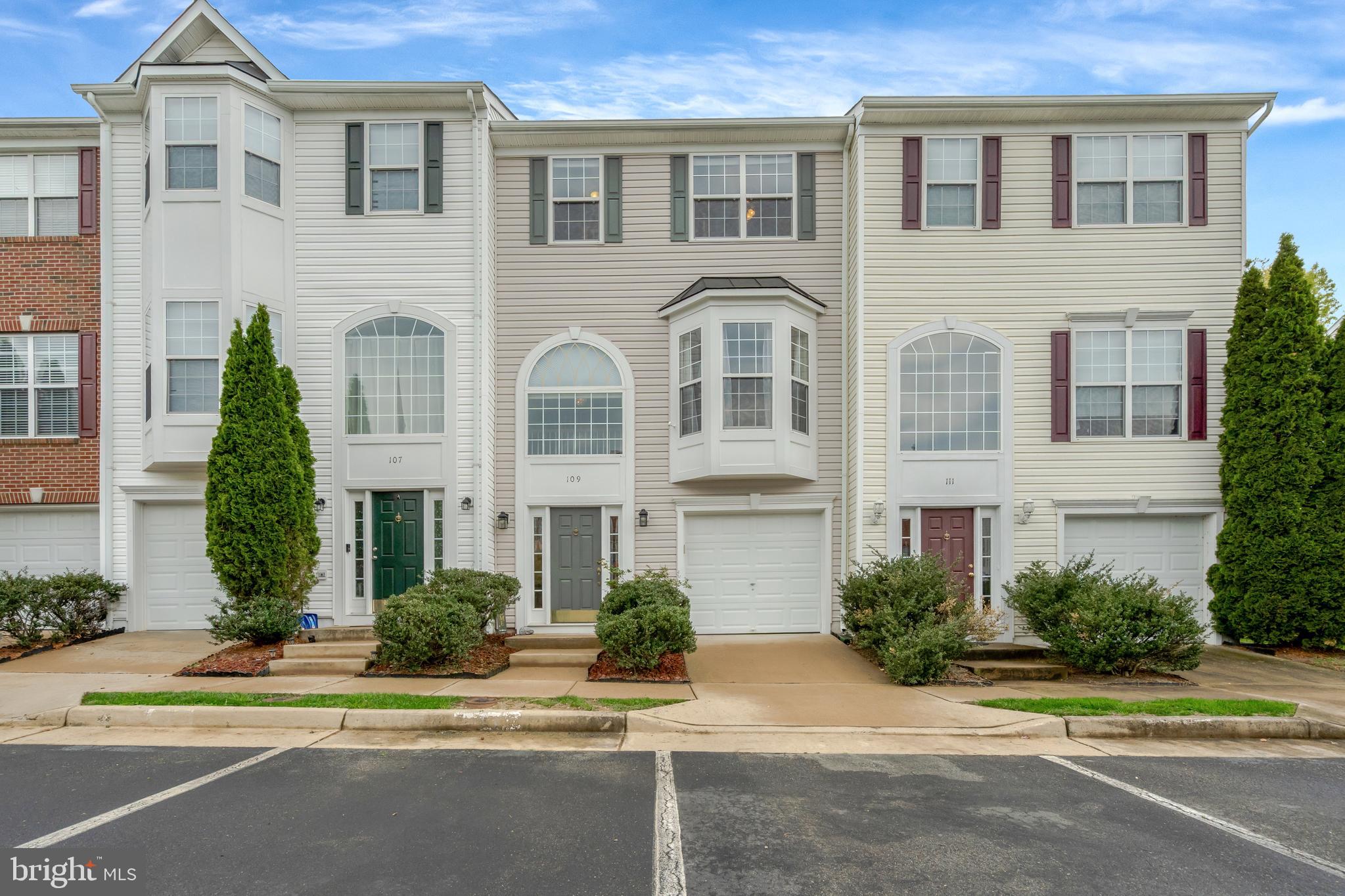 Located in sought-after Tamarlane, this bright and spacious three-level townhome offers functionality and versatility. The floor plan creates a bright and cheerful living space. The large kitchen has a center island and a sliding glass door to the deck, making it easy to entertain your friends and family. The primary bedroom suite boasts a walk-in closet and an en-suite bathroom with a dual sink vanity, a soaking tub, and a walk-in shower. The foyer and top two levels of the home have beautiful hardwood flooring.  The entry level has a large recreation room with a sliding glass door to the lower-level deck and backyard. You will especially appreciate that this home has a garage, two decks, and a generously sized storage shed...features that are not offered in many of the neighboring properties. In addition to the attached garage, you will love having two assigned parking spaces in front of your home and plenty of additional visitor parking. The popular Tamarlane community offers convenient amenities, including a playground, dog park, and walking/jogging trails.  This home is in an excellent location, and the long-time current owners have appreciated the proximity to restaurants, shopping, and plenty of commuting options.
