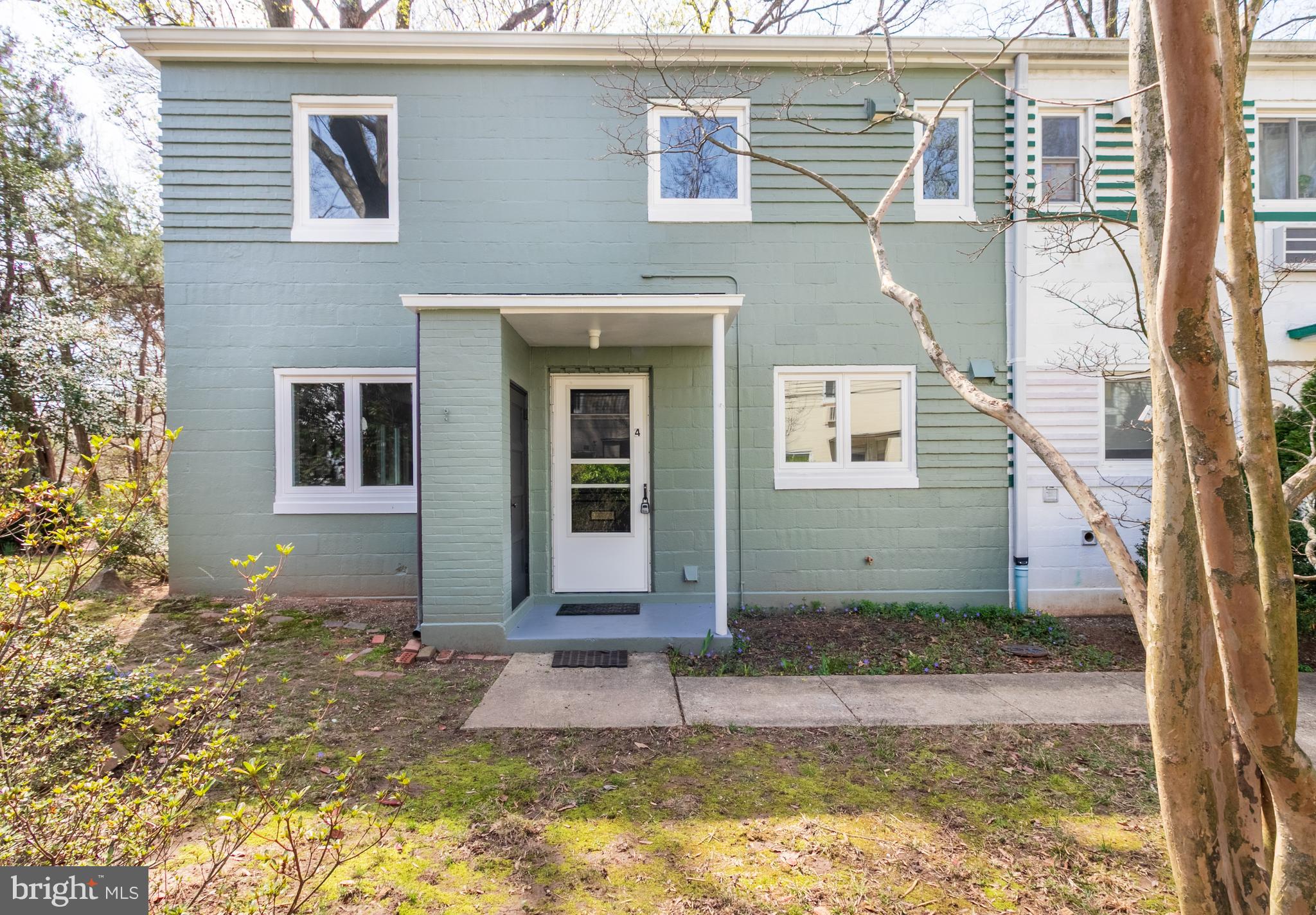 Stunning at every level! This three bedroom, end unit has been remodeled from top to bottom with no detail missed. A gorgeous, brand new kitchen has been installed with all new appliances including a front loading, under the counter washer and dryer.  New flooring throughout, new paint, and a completely remodeled bathroom. Elegant fixtures and serene finishes blend perfectly with the natural  setting.  A mini-split system provides energy efficiency. The exterior has been repainted in a soft green. The renovated sunroom boasts  multiple sunny windows allowing for the most peaceful views of the   sunset and  trees.  A mini-split system provides energy efficiency.  Let's just check off more boxes on this dream home, shall we?! Parking next to home,  secluded location, path at rear of home leading to the lake,  and beyond move-in-ready!  The coop fee includes the property taxes.