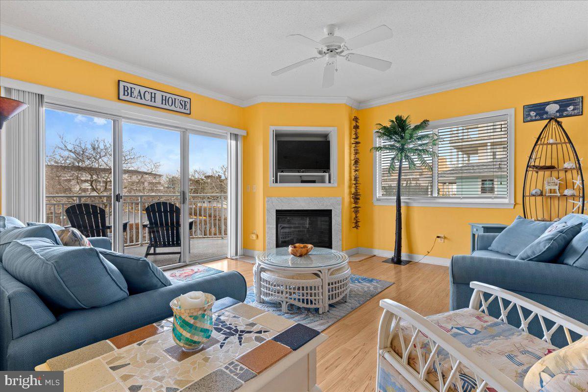 This bright, welcoming 3-bedroom, 2-full bathroom condo in the Aventura building offers an exceptional opportunity for residents as well as investors seeking a blend of comfort and potential returns. Built in 2003, this well-maintained property boasts a generous 1,297 square feet of living space, perfect for attracting a diverse range of tenants and plenty of room to spread out. Step inside to discover an inviting open floor plan that seamlessly connects the living, dining, and kitchen areas. The combination of wood floors and plush carpeting creates a warm ambiance, while the ceiling fans and window treatments enhance the comfort of the space. The kitchen is a chef's delight, featuring ample counter space, an eat-in area, and all needed appliances including a dishwasher, microwave, and electric oven/range. The wet bar adds a touch of luxury, perfect for entertaining guests. The primary suite is a true retreat, complete with a luxurious soaking tub and a walk-in shower, ensuring a spa-like experience at home. Additional features include a cozy gas fireplace, ideal for those chilly evenings, and convenient in-unit laundry facilities. Outside, the property shines with its corner lot location, offering a huge balcony that provides breathtaking views of the bay and ocean. The community amenities include a rooftop pool, perfect for relaxation and social gatherings. An outside shower adds convenience after a day spent enjoying the sun. Parking is a breeze with two assigned off-street spaces, as well as on street, ensuring that tenants have easy access to their vehicles. The building is equipped with security features such as a locked building entry and fire detection system, providing peace of mind for residents. Investors will appreciate the potential for strong rental income in this desirable location, coupled with the low maintenance of a well-constructed unit. The combination of excellent condition, modern amenities, and prime MID-TOWN location makes this property a prime candidate for long-term appreciation. You are within walking distance to many great restaurants and conveniences including Fager's Island, Mackey's Bayside and Secrets. With its inviting atmosphere and strategic features, this Aventura unit is not just a place to live; it's a smart investment opportunity waiting to be seized. Don't miss your chance to own a piece of this vibrant community!