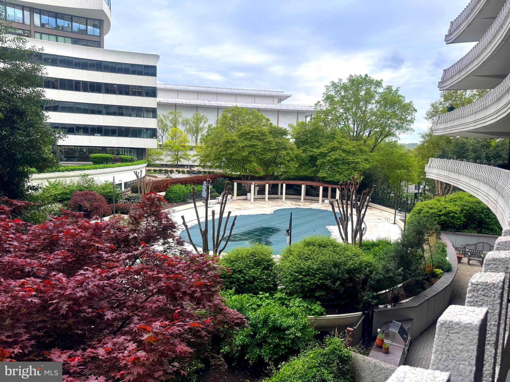 Few landmarks hold as much historic significance and are envied as distinguished residences in the United States like the Watergate. Experience luxury living complemented by 24/7 front desk & doorman service, outdoor heated pool, fitness center, shops and restaurants. Located in one of DC’s most iconic neighborhoods, with walking distance to the Kennedy Center, Georgetown Waterfront, bicycle paths, Foggy Bottom Metro, Watergate Hotel & Spa, GWU, dining, Trader Joes, Whole Foods and many cultural, political and social venues! Monthly co-op fee includes 24/7 front desk, doorman, utilities, property taxes, outdoor pool, fitness center and secure garage parking to name a few. Unit #303 is a two-bedroom where one wall has been removed to create a den; seller will consider restoring the wall if the purchaser requires. Below, the lush gardens and swimming pool are enjoyed from the spacious terrace. A designated private parking space and a secure storage unit convey masterpiece in one of America’s most storied addresses.