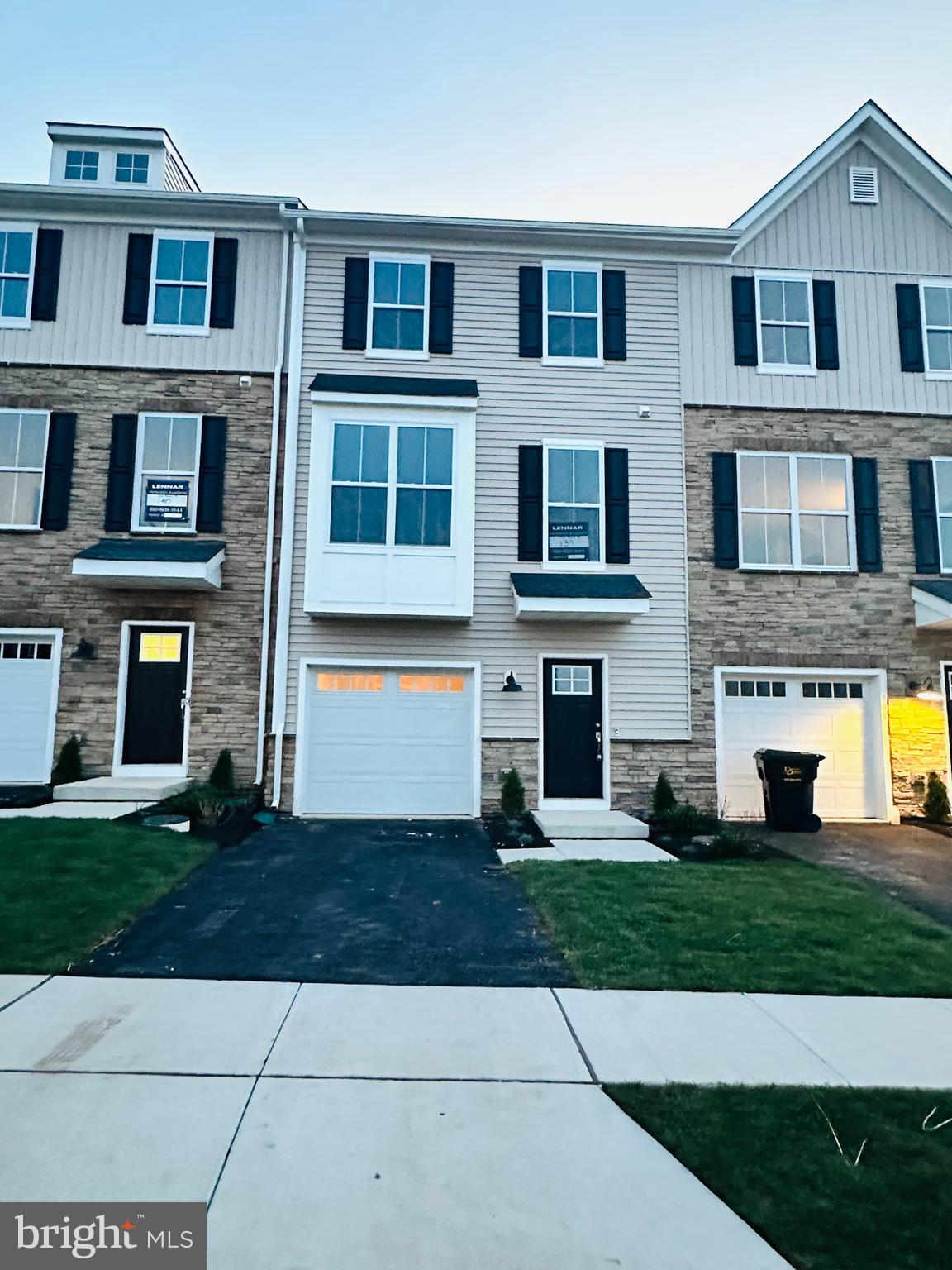 North East facing brand New townhome with a floorplan that will wow you from entering . A FINISHED lower level is included, perfect for that *bonus* room that can be personalized to fit your needs and can be used as bedroom, office, gym room or play room or entertainment room. Upstairs, an open airy main living space includes your kitchen with extra large island, stainless appliances, and great room. Upstairs you will find a primary retreat with en suite, and two adorable additional bedrooms for the little ones, guests, home office, home gym, storage Surrounded by the scenic outdoors, residents will enjoy being moments from the nearby Schuylkill River trail, local parks and plenty of opportunity for those who enjoy nature and an active lifestyle. For residents who enjoy the city life, they will love being just minutes from downtown Phoenixville and an easy commute into Philadelphia, King of Prussia, Wayne, Malvern, Oaks, Royersford, Collegeville, Chester Springs, Exton, Downingtown as well as many other local and very desirable destinations. Home comes with smart technology such as Ring Doorbell, Ring Security System, Mesh Wi-Fi, Garage Door Opener Honeywell Smart Thermostats, smart door lock and. Smart washer dryer Available now. Refrigerator, washer and dryer included.