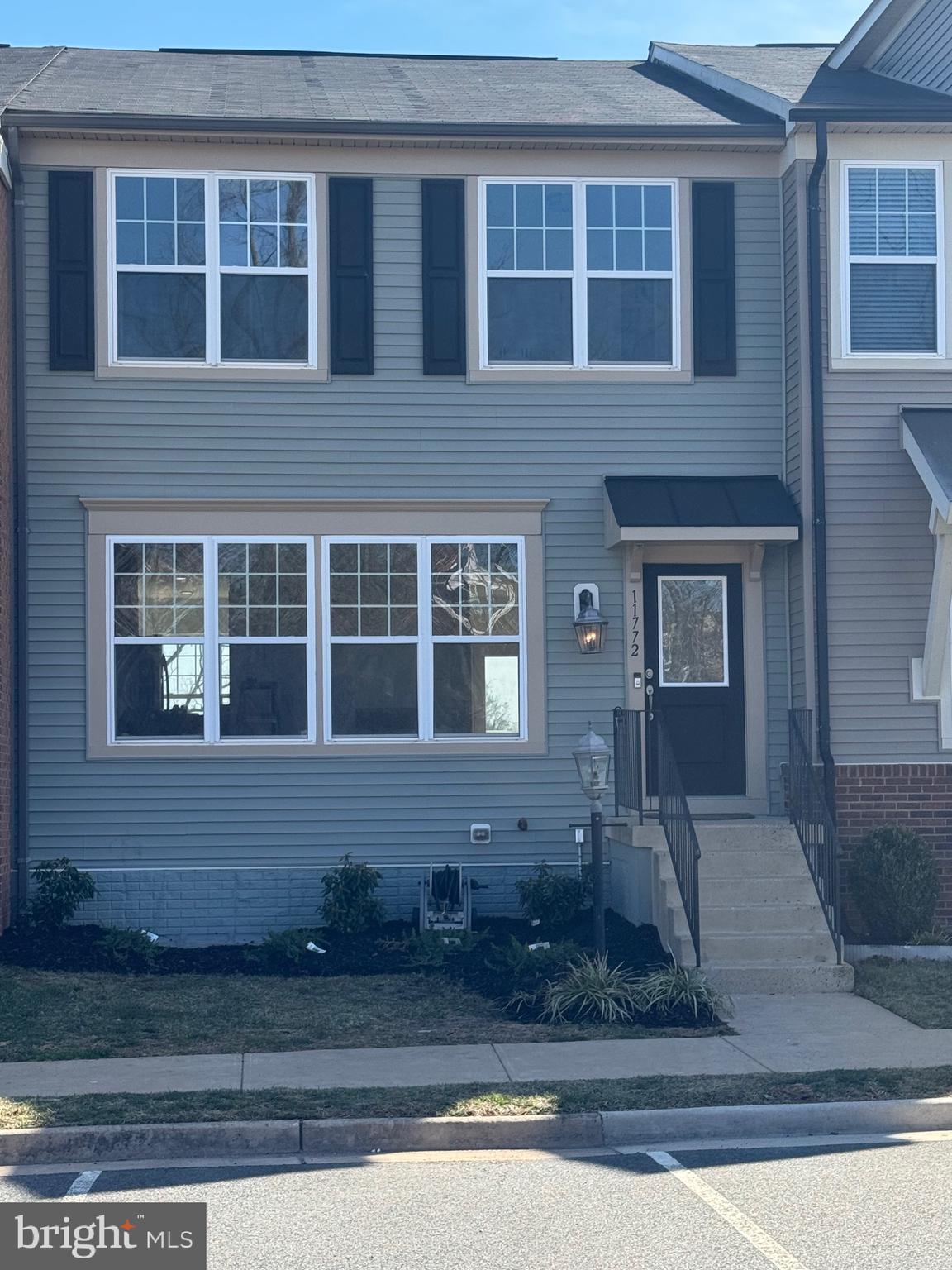 STUNNING CONTEMPORARY TOWNHOME WITH SINGLE-FAMILY FEEL IN PRIME BRISTOW LOACATION!  Welcome to this magazine-worthy, fully renovated 2,800 sq.ft. McLean model TH-an interior gem designed for both entertaining and everyday comfort. Boasting brand new updates inside and out, this home is truly move-in ready!
MAIN LEVEL: Flooded with natural light, the open concept main level is a showstopper. A bright foyer welcomes you into a versatile formal dining area, leading to a gourmet kitchen featuring sleek quartz countertops, stainless steel appliances, a custom tile backsplash, a large sit-down breakfast bar and modern 42" shaker-style cabinetry. The open layout flows seamlessly into a cozy living room with a built-in electric fireplace, which extends onto an expansive deck overlooking serene wooded and pond views. Best of all, the land behind the home is protected and cannot be developed, making this one of the most desirable lots in the community.
SECOND LEVEL: Retreat to the luxurious primary suite, complete with a private en-suite bath with soaking tub, built-in electric fireplace, double vanity, oversized rainfall shower and a spacious walk-in closet. Down the hall, two additional bright and airy bedrooms share a full bath, offering comfortable accommodations for family or guests. A bedroom-level laundry closet and spacious linen closet add to the home's convenience.
LOWER LEVEL: The fully-finished, walk-out lower level provides incredible flexibility with a large family room featuring a built-in electric fireplace, a fourth bedroom, full bath and a versatile flex space--perfect for a home-office, gym, playroom or a 5th bedroom.
COMMUNITY & LOCATION: Located in the prestigious Stillhaven Community, this sought-after no-thru street neighborhood offers a tot lot/playground, community grills, picnic areas and beautifully maintained grounds. Enjoy the convenience of being just minutes away from downtown Bristow, multiple town centers, shopping, dining nightlife, movie theatre and Harris Teeter. With top-rated schools and easy commuter access, this location is unbeatable! Don't miss your chance to own this stunning, fully renovated townhome. Schedule your private tour today!!