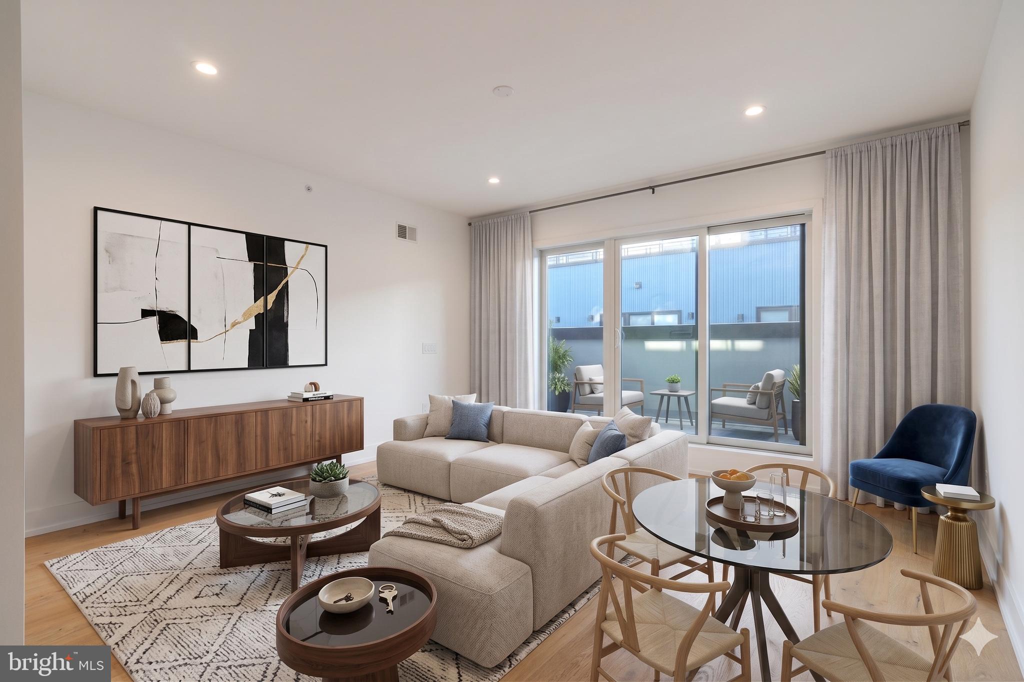 LAST ONE LEFT at  REGENTS ROW, a 20 home community with GARAGE PARKING .   Location location location here as the community is  in the HOTTEST part of South Kensington.  Regents Row is is a private HOA community of townhomes designed to make modern luxury living simply the best it can be. Designed by renowned architect Atrium Design Group, the modern exterior of these townhomes consist of concrete, Hardie plank, steel, and glass. The thoughtfully designed interiors offer 3 bedrooms, 2 full bathrooms, a powder room on the first floor, a 1 car garages, a finished basement, and city-view roof decks.  The bright, open main level has space for separate living and dining areas. The gourmet kitchen features an eat-in island, quartz countertops, & custom European cabinetry. Plus, a large 10’x16’ deck sits off the living room! Below, the 1st floor/garage level and basement level each include an additional finished bonus room/den. The third level has two generous sized bedrooms, a full hall bathroom, and a conveniently placed laundry room. On the fourth level is where your new oasis awaits. The entire floor is dedicated to the master suite! Flanked by balconies on each side, there’s a huge master bedroom, double closets, and a spa-like bathroom with PORCELANOSA tile and GROHE fixtures. This home is made complete by an expansive roof deck with spectacular city views, the perfect place to spend your summer days!   Two outdoor decks and a huge porch  off the living room.  Fireplace upgrades and many more !Contact us today for in-person and virtual touring options! 10 year FULL  tax abatement.   Property is vacant and easy to show - superb for a quick settlement.  This will sell fast so make your appointment today !  Vacant an easy to show !