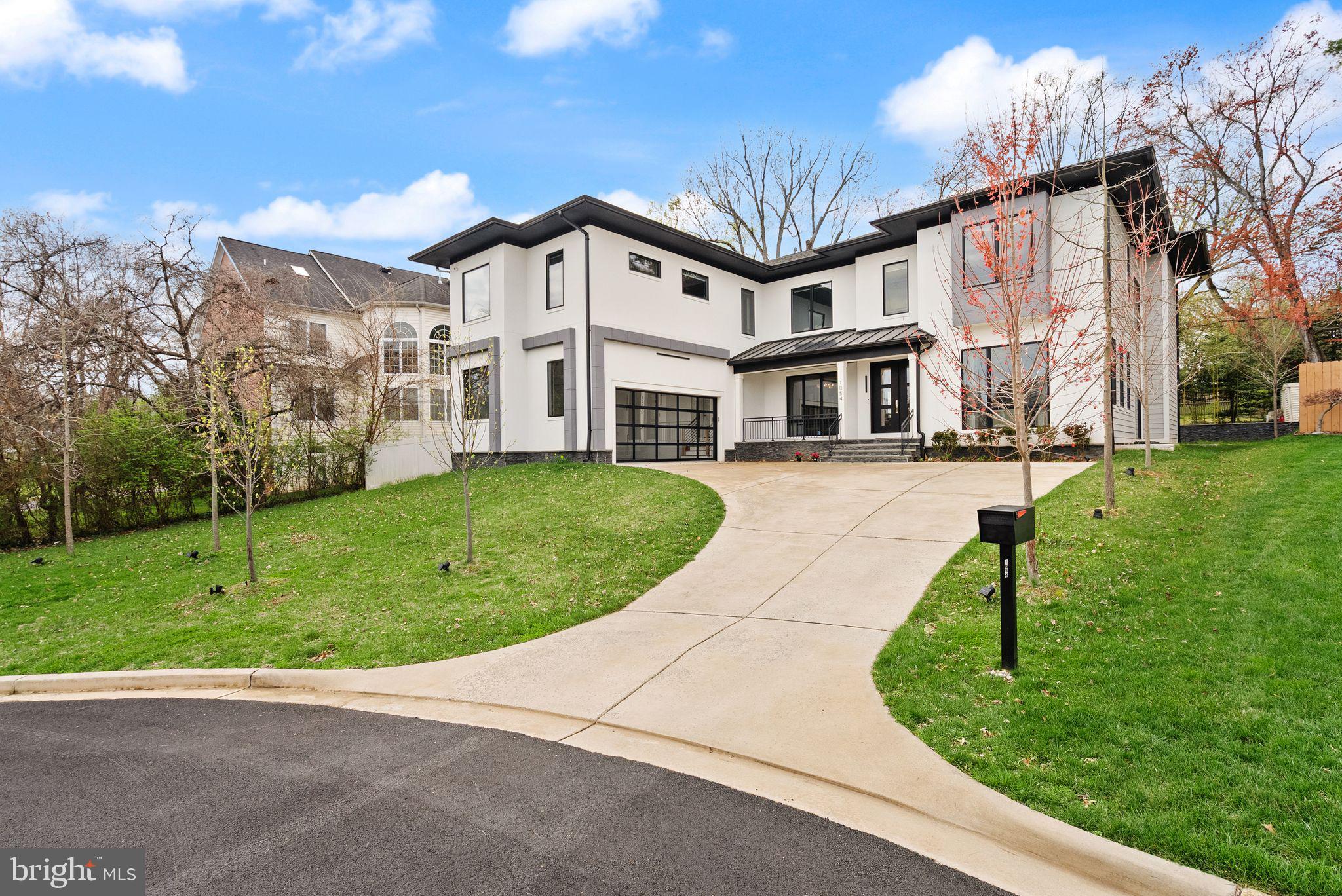 Prime location on a quiet cul-de-sac in the heart of McLean, this one of a kind,  2022-built contemporary residence offers the perfect blend of modern design, luxury finishes, and thoughtful functionality.  There isn't another home like this!!  You will  love the fusion of new construction with tasteful owner personal touches- the best of both worlds!   Boasting 7 bedrooms and 6.5 baths, this stunning home is crafted for both everyday living and elegant entertaining.

A striking open-concept layout showcases a show stopping  chef’s kitchen outfitted with high-end appliances, sleek custom cabinetry, and designer touches throughout. Expansive living and dining spaces are flooded with natural light, while a fantastic enclosed porch with a gas fireplace offers the ideal setting for al fresco dining and relaxing outdoors—without the bugs—creating a seamless indoor-outdoor lifestyle.

The luxurious primary suite is a true sanctuary, featuring spa-inspired finishes such as heaters floors  and expansive dual walk-in closets. Each additional bedroom is generously sized with beautifully appointed baths.
The fully finished lower level is designed for entertainment and relaxation, complete with a media room, gym, and wet bar—perfect for hosting gatherings or enjoying cozy nights in.

With its one-of-a-kind contemporary styling, premium upgrades, and prime McLean location, this home presents a rare opportunity for refined living in a peaceful, private setting.