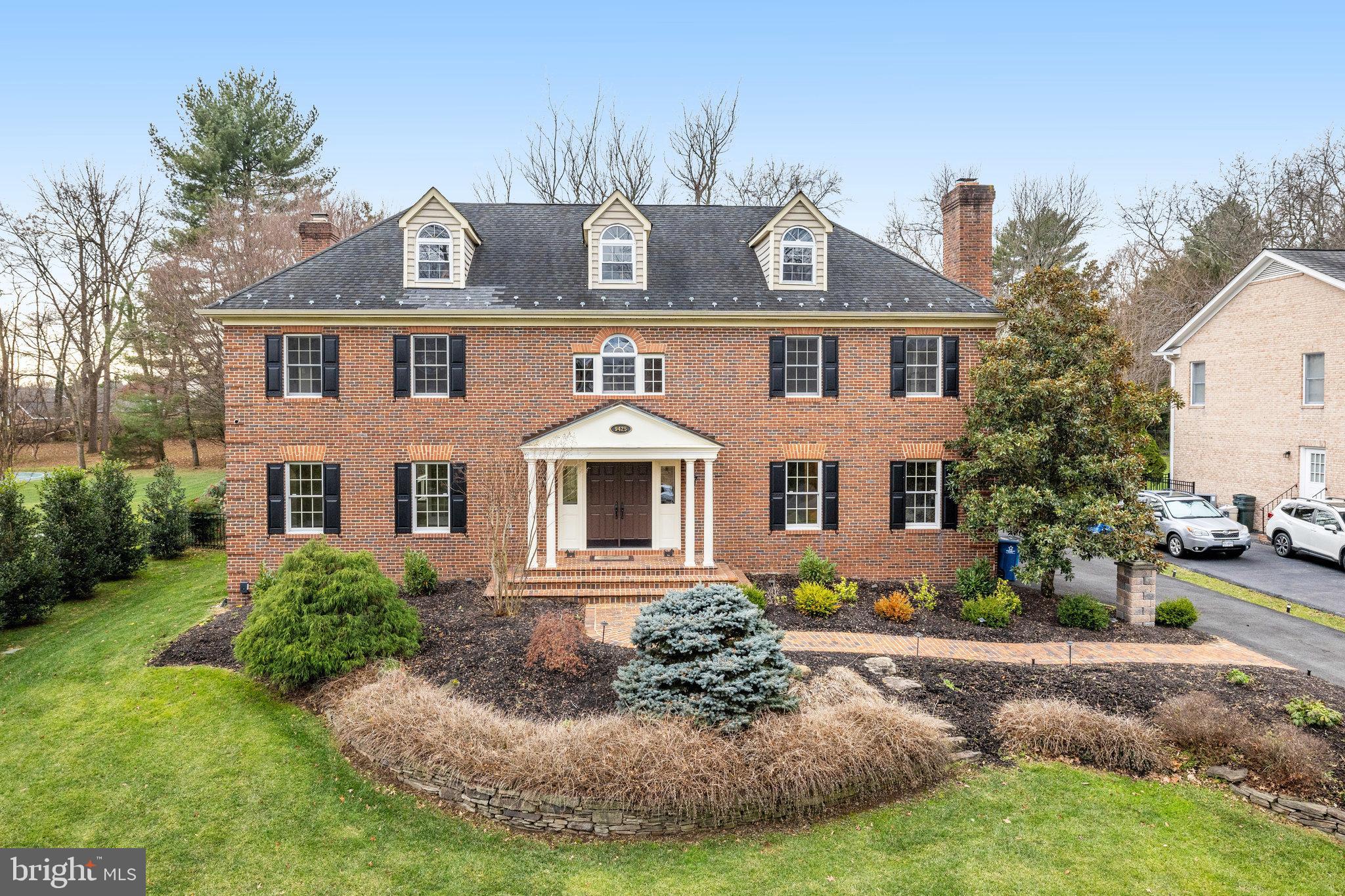 Welcome to 9425 Lakeside Drive, an exquisite Georgian-style home located in the prestigious Spring Lake community of Vienna, VA. This luxurious property offers an impressive 6,246 square feet of living space, featuring five bedrooms and five and a half bathrooms, designed to cater to your every need.

Upon entering, you are greeted by a grand foyer that sets the tone for the rest of the home. The main level includes a versatile office or bedroom with a full bath, ideal for guests or remote work. The spacious living areas are complemented by an enclosed patio with seating, perfect for year-round enjoyment.

The primary bedroom is a sanctuary, complete with a marble fireplace, dual walk-in closets, and a lavish en-suite bathroom. The additional bedrooms are generously sized, each offering ample closet space and en-suite bathrooms for ultimate convenience.

The home's two-zone heating and cooling system ensures comfort throughout the year. The expansive backyard is a true retreat, featuring an iron fence, a playground, and a deck with a hot tub, ideal for outdoor entertaining and relaxation.

Wine enthusiasts will appreciate the dedicated wine closet with a chiller, while fitness aficionados will enjoy the glass-enclosed workout room. The basement offers bonus rooms that can be customized to suit your lifestyle needs, whether it be a home theater, game room, or additional guest quarters.

Security and convenience are paramount, with features such as a Ring doorbell, exterior cameras and an iron-fenced backyard. The property is located near the serene Spring Lake, providing a picturesque setting and a sense of community.

This home embodies luxury living at its finest, offering a unique blend of elegance, comfort, and modern amenities. Do not miss the opportunity to make 9425 Lakeside Drive your new residence. Contact us today to schedule a private viewing and experience this exceptional property firsthand.