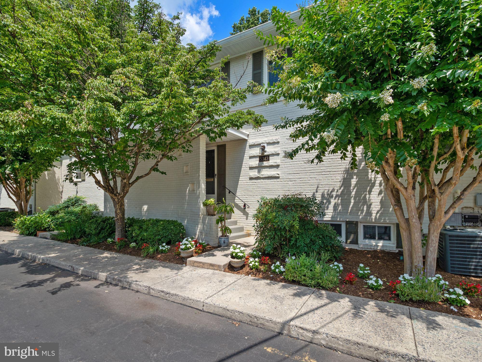 This bright and spacious townhome is hard to find in this premier location with all that Bethesda has to offer. Three finished levels  have been tastefully renovated with plenty of natural light in each level. Enter the large space of the living room that flows into the open concept dining room with a large updated kitchen. Upstairs you will find 3 bedrooms and 2 beautifully renovated bathrooms, one of them is privately accessed from the primary room. The finished walkout lower level is home to a large family room, a 4th bedroom, and a full bath which are perfect for the privacy of your guests or for home office. This level opens to a secluded rear outdoor space with patio overlooking a serene private yard where the family can enjoy summer gatherings. The home is tucked in a sweet spot in the community in a quiet cul-de-sac with two perfectly located parking spaces just in front of the main entrance. This amazing neighborhood is located in a prime area surrounded by so many amenities, and walking distance from the French International School Rochambeau. Abundant access to trails and parkland. Close to several Metro stations, minutes to Downtown Bethesda, DC, Virginia, and easy access to the beltway. Public ride-on buses and school bus stops are just around the corner.