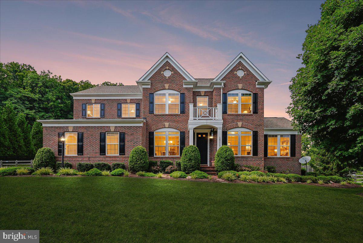 The approach sets the tone as you're arriving home at 16119 Turning Leaf Lane, with a distinctive view of the Selma Mansion just before the final turn. Set on .60 acres along a cul-de-sac street in Historic Selma Estates, this stately brick-front residence offers 5-bedrooms, 4.5 bathrooms, a 3-car garage, and more than 4,500 finished square feet across three levels. The property abuts Selma Mansion grounds, adding another layer to its historic setting. 

Step inside to discover recently refinished hardwood floors that flow effortlessly throughout the main level, perfectly accented by crown molding, wainscoting, and an elegant tray ceiling. Expansive windows in the main living area offer a sun-drenched, open, airy, and welcoming atmosphere. A warm gas fireplace serves as the perfect centerpiece for relaxing and entertaining.  

The spacious kitchen is designed for both everyday living and entertaining. An oversized granite island provides generous workspace and seating, surrounded by abundant cabinetry, additional counter space, built-in wine storage, and new appliances featuring double ovens. Direct access from the kitchen area to the patio makes it easy to extend gatherings outdoors and enjoy the backyard. 

Just off the foyer, the sunroom offers a bright and versatile retreat that works equally well as a sitting room, reading room, or home office. A mudroom connects the main level to the 3-car garage, providing a practical landing area and additional organization. 

Uppermost level features a massive primary suite with two large walk-in closets and a private bath with a double vanity, soaking tub and walk-in shower. Another large bedroom offers its own private bathroom and walk-in closet, while two additional bedrooms are served by a hall bathroom with a double vanity. Laundry is conveniently located on the bedroom level. 

The walkout lower level extends your living space with a fifth bedroom, full bathroom with a walk-in shower, and a spacious recreation room. It also offers ample storage and pre-fitted for an easy kitchen conversion. This level seamlessly connects to the backyard, creating an inviting indoor-outdoor flow that easily accommodates guests, family gatherings, or your daily living needs.  

Outside, manicured grounds and established landscaping complement the home's classic brick exterior. The backyard and patio provide privacy and plenty of room to entertain, dine outdoors, or simply enjoy the setting. With its memorable approach, .60-acre lot, expansive open floorplan, three-car garage, 16119 Turning Leaf Lane offers a distinctive opportunity in Historic Selma Estates.
