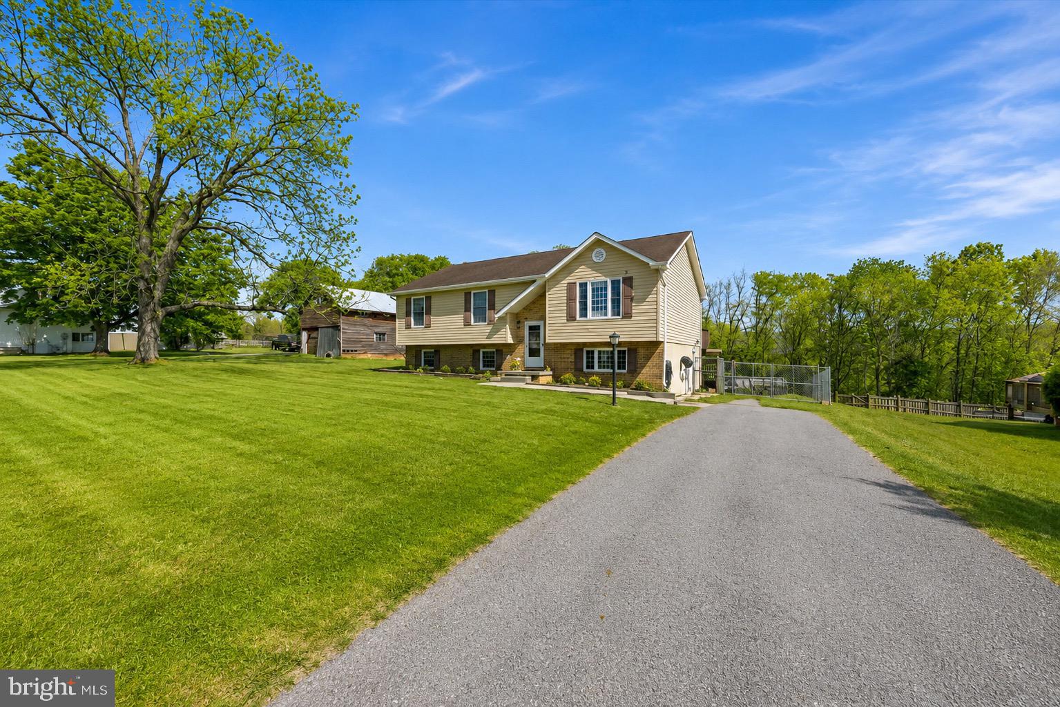 🔥 PRICE IMPROVEMENT – MOTIVATED SELLERS! 🔥

This is your opportunity to get more home for your money in the beautiful Shenandoah Valley! If you’ve been waiting for the right home at the right price, now is the time to take another look at 25996 Old Valley Pike.

This spacious 4-bedroom, 3-bathroom split foyer offers the flexible layout today’s buyers are searching for. Featuring beautiful hardwood floors, stainless steel appliances, a bright and inviting living space, and a private primary suite, this home is truly move-in ready.

Need extra space? The fully finished lower level includes an additional bedroom, full bathroom, and a large bonus room that could easily function as a potential 5th bedroom, home office, gym, recreation room, playroom, or guest suite.

Outside, you’ll find one of this property’s most desirable features—a large, level yard that’s perfect for children, pets, outdoor games, and entertaining. The fully fenced backyard provides a secure space to play, while the property extends well beyond the fenced area, offering even more room for activities, gardening, or simply enjoying the outdoors. The above-ground pool is ready for summer fun and family gatherings.

With no HOA restrictions, you’ll have the freedom to enjoy your property your way.

Conveniently located less than 5 minutes from I-81, this home offers the perfect blend of country charm and commuter convenience. Enjoy stunning mountain views, peaceful surroundings, and easy access to Woodstock, Strasburg, Winchester, and Harrisonburg.

🏡 Recently improved price!
✨ 4 Bedrooms | 3 Full Bathrooms | Potential 5th Bedroom
🌳 Large Yard That Extends Beyond the Fenced Area
🏊 Above-Ground Pool
🚗 Less Than 5 Minutes to I-81

📲 Schedule your private showing today and see why this home offers exceptional value in Shenandoah County!
