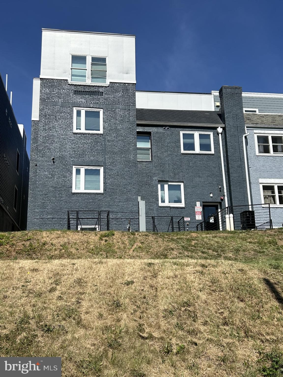 This fully renovated 7-unit building, partially leased multifamily asset presents a compelling opportunity to acquire a stabilized income-producing property with subsidized, guaranteed rental income already in place. The property offers a flexible mix of self-contained apartment units ranging from four bedrooms to six bedrooms, each updated to meet modern residential standards and fully self-contained. It has 2-6bedroom 4-5 bedroom and 1–4-bedroom units. With occupancy secured from day one, the asset is positioned to deliver immediate cash flow, durable income stability, and long-term investment upside. Situated on a large lot with rear parking, the property enjoys convenient access to the Rhode Island Avenue Metro station, Union Market, nearby retail, restaurants, and neighborhood amenities along 12th Street. This offering is well suited for investors seeking a renovated, cash-flowing multifamily asset in a well-connected and desirable neighborhood.