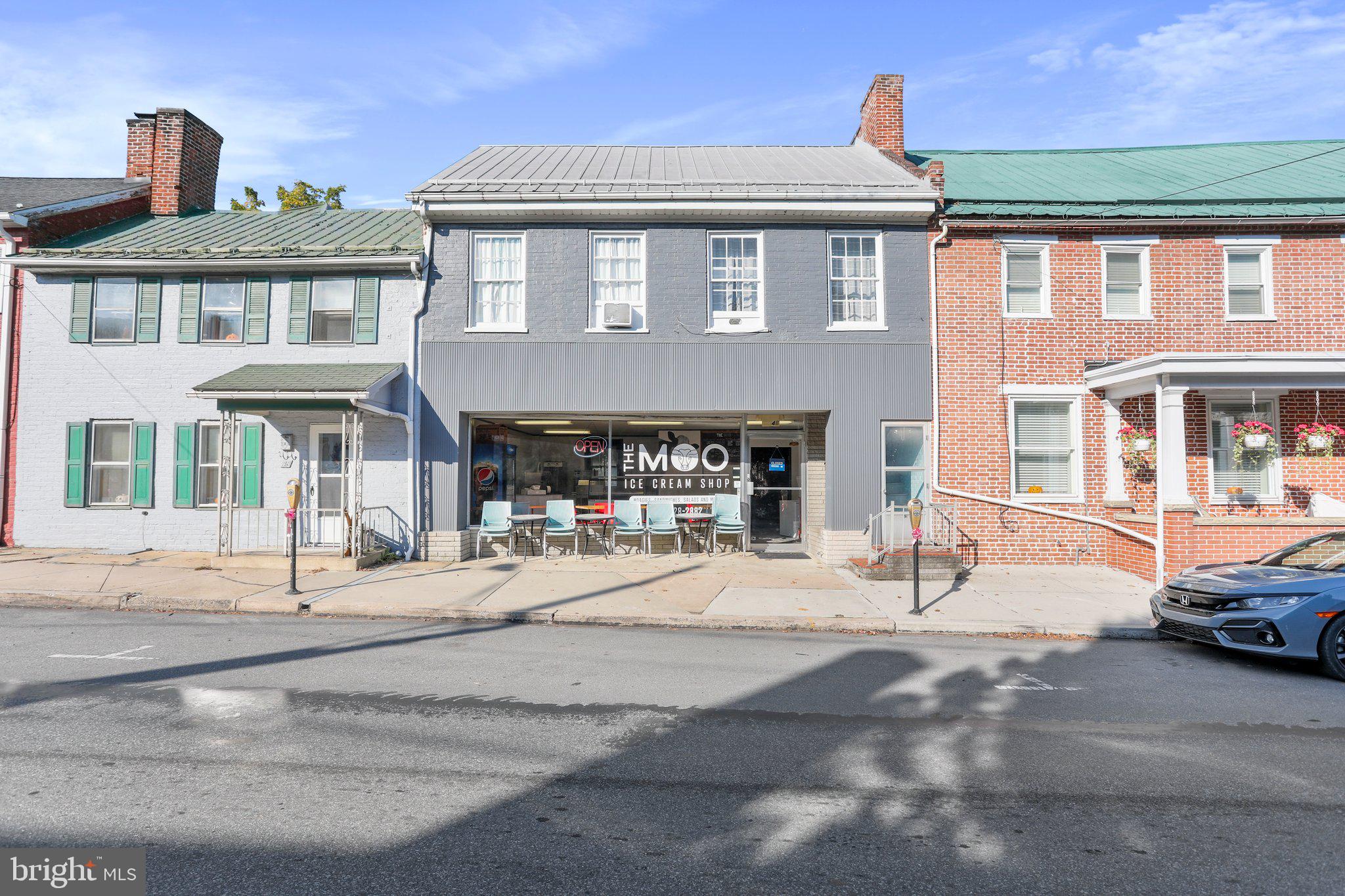 EXCLUSIVE AND VERY RARE OPPORTUNITY to purchase a piece of historical Mercersburg, Pennsylvania. The options are endless- bottom of the building is a perfect storefront for running a business while the second floor is a fully functional two bedroom apartment that could be used for primary residency, long-term rental, or continue it's use as a short-term rental opportunity. The sellers have dedicated themselves to improving every inch of this gorgeous building! Along with the amazing backyard space, you also can't compare to the convenience of this location- close by you will find food, entertainment, coffee shops, bookstores, and much more. Also, only just a few blocks from Mercersburg Academy. This is one you simply don't want to miss!