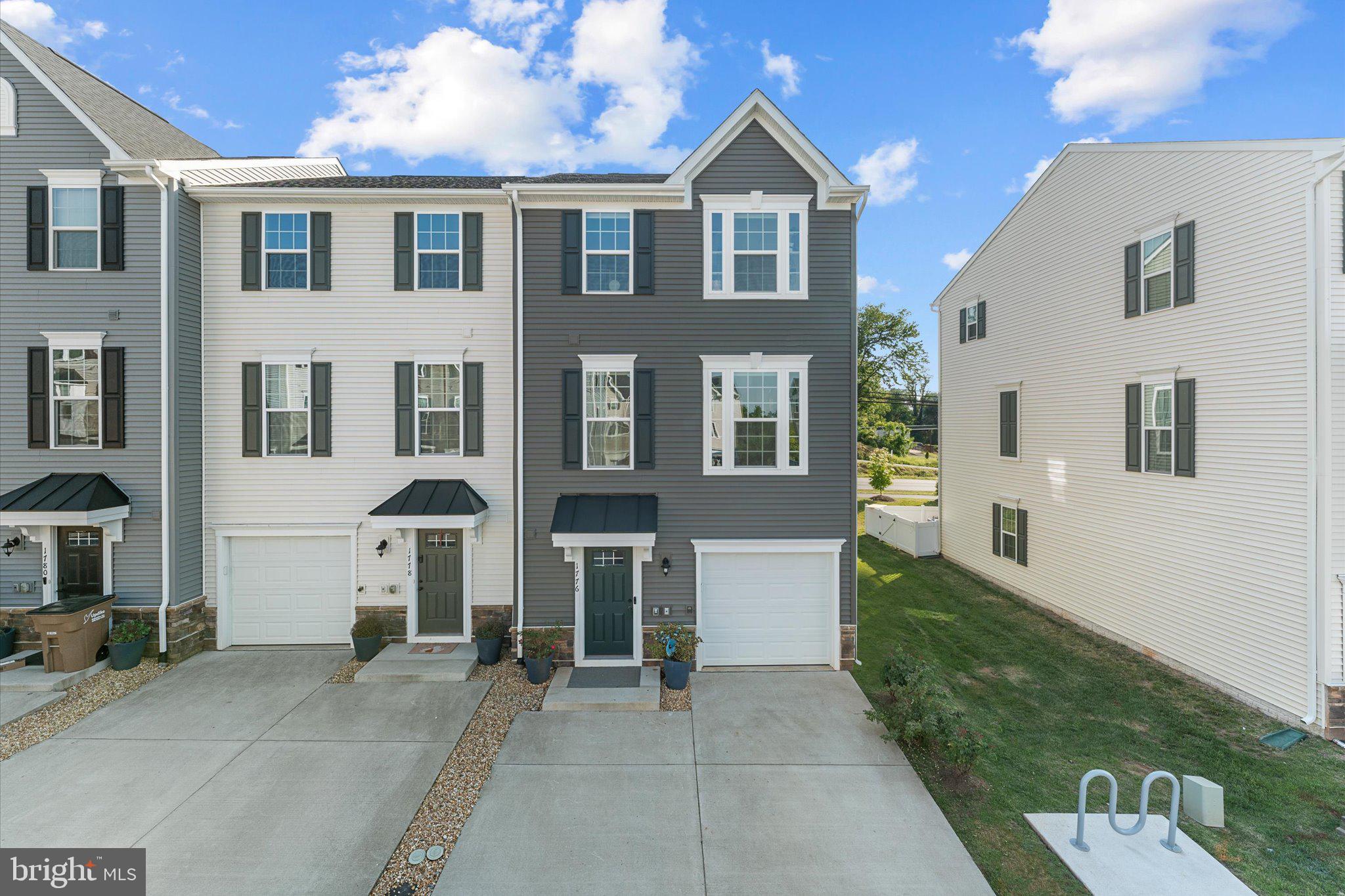 Bathed in natural light, this stunning end unit townhome built in 2023 offers the perfect blend of style, comfort, and functionality across three beautifully designed levels.

Flooded with natural light from multiple exposures, this stunning townhome offers a bright open feel and end unit homes like this don’t come along often. Conveniently located near Main Street Culpeper, you’ll enjoy easy access to charming local shops, restaurants, dining, and everyday conveniences just minutes from your doorstep.

Step inside and immediately notice the soaring 9-foot ceilings, modern finishes, and spacious layout designed for both everyday living and entertaining. The heart of the home is the beautifully appointed kitchen featuring granite countertops, stainless steel appliances, warm wood cabinetry, updated backsplash, new pendant lighting, additional recessed lighting, and a spacious eat in area perfect for casual dining or morning coffee. Just off the kitchen, enjoy seamless indoor-outdoor living on the private deck  ideal for relaxing evenings or hosting friends and family.

Upstairs, the spacious primary suite feels like a retreat with its elegant tray ceiling, abundant natural light, and spa like comfort. Two additional generously sized bedrooms provide flexibility for family, guests, or work from home needs. The home offers 2 full bathrooms and a convenient main level half bath.

The versatile lower level includes a bonus room with sliding glass doors leading to outdoor space and ready to make it your own. Whether you envision a home office, gym, playroom, media room, or cozy lounge space, the possibilities are endless.

Additional highlights include a a single-car garage, a spacious 2-car driveway and brand new washer and dryer purchased in 2025 and the peace of mind that comes with owning a nearly new home with thoughtfully selected upgrades already in place.

If you’ve been searching for a bright, modern, move-in ready home with space, style, and flexibility, this is the one. Schedule your private showing today before this exceptional end unit townhome is gone!