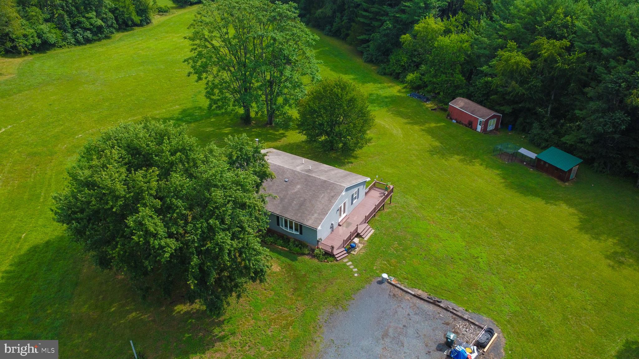Located among wineries, farmers markets and antique shops in the quaint little area of Lucketts... and yet just minutes from the town of Leesburg, & convenient to the MARC train. This house is BIGGER THAN YOU THINK. Four bedrooms, three full baths. Larg The rec room in the basement was built for watching the game, and playing pinball or paddleball or shooting darts....or whatever you like to do when chillin' with your friends. It is a really great house.... But the land? It's nothing short of dreamy. Bring your pets, your kids, your chickens, your cars /trucks /boats /RVs /4wheelers... BRING IT ALL... Install an orchard, a garden, or start your own farmette. There are no HOAs to deal with here. Imagine the possibilities. This home has hosted multiple weddings, cookouts, parties, concerts and too many "backyard campouts" with friends to count. And today, this lifestyle is for sale. Is it right for you? Come see.