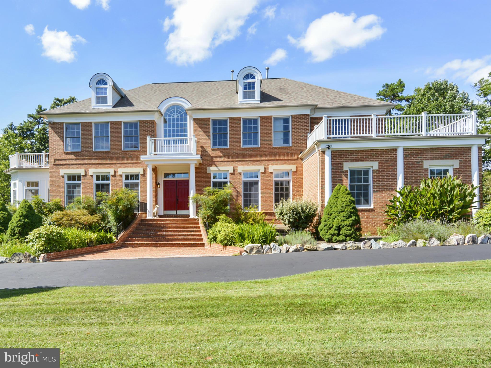 Gorgeous sun-filled Estate in prestigious Palatine! Circular driveway leads to all brick colonial over 8000sq. sited on 2 ACRE private lot. Features 2 story marble foyer, banquet dining, 6-sided Conservatory, gourmet kitchen w/island/breakfast bar, library,dramatic great rm w/stone FP, sumptuous Master Suite/Bath, enormous walk-out basement w/wet bar,game rm,guest suites, 3 car garage! Must See!