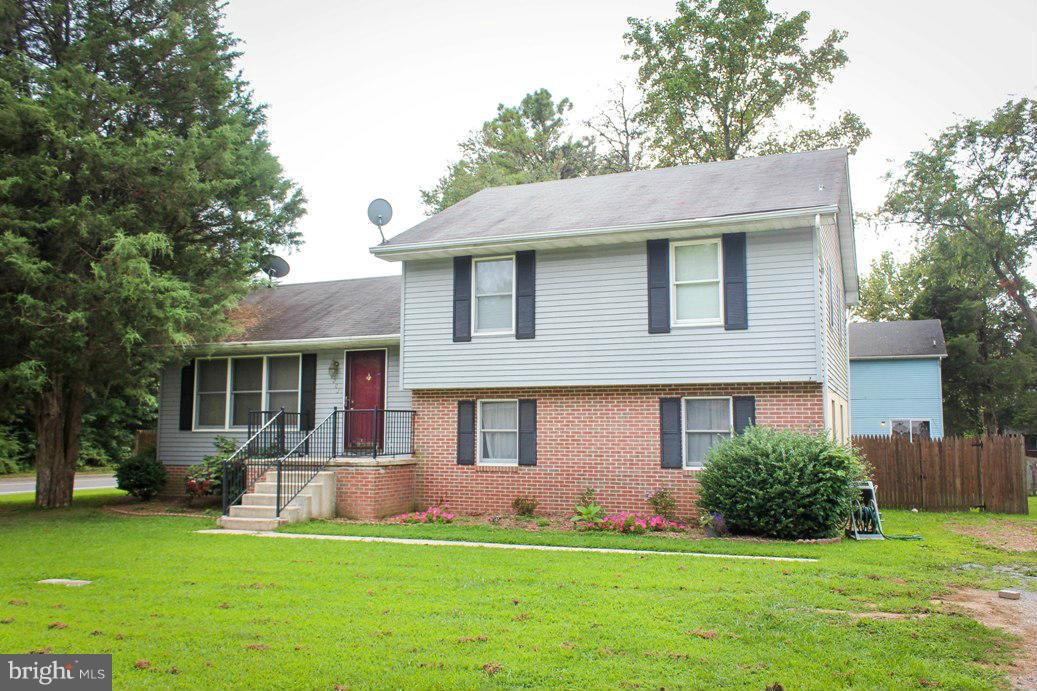 3 Bedroom 2 bath split level ready for occupancy.  Short sale subject to third party approval. Upper level has new carpet.  Unfinished basement has plenty of room for storage. Deck off the back.   Nice corner lot with a  fenced in back yard and shed.