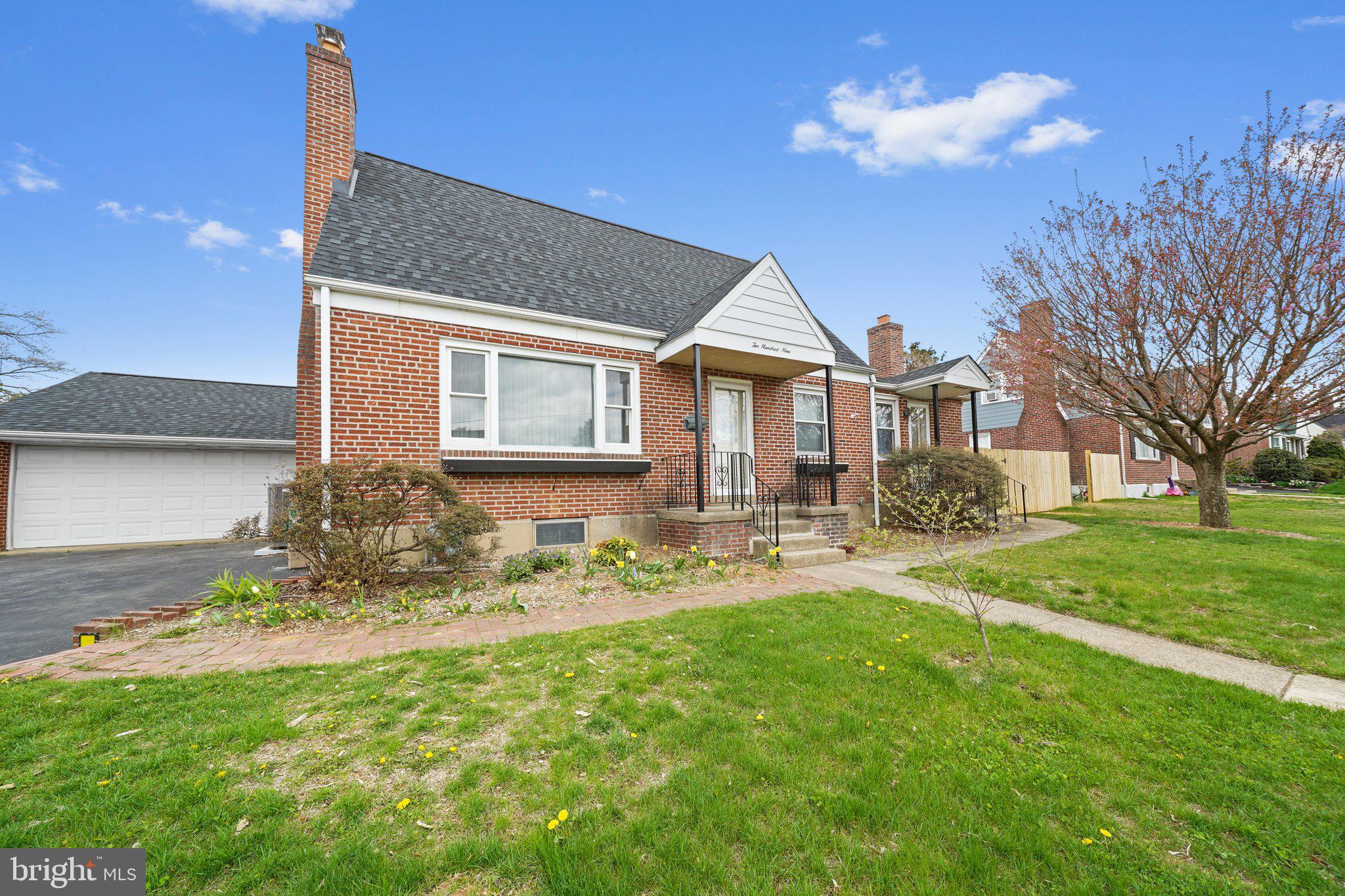 Welcome to 209 2nd Ave, a unique five bedroom two bath brick cape in the Heart of Broomall! Step inside to a warm and inviting living room featuring a wood-burning fireplace—perfect for cozy evenings. The main floor also includes a comfortable first-floor bedroom and a full bath, ideal for guests or flexible living.

Continue through to the kitchen, complete with newer appliances, which opens to a spacious family room on one side and a formal dining room on the other. Beyond the dining room, you’ll find a second family room with a gas fireplace—great for gatherings or quiet nights in. From here, step out to the enclosed three-season patio, offering extra space to relax or entertain.

Upstairs, you’ll find four additional bedrooms, each with unique vaulted ceilings, built-in drawers, and charming bookshelves that add both character and storage. A full bath completes the upper level.

The finished basement provides a large recreation area, plus a sizable storage room that includes laundry—perfect for keeping things organized and out of sight.

This home is full of thoughtful updates, timeless character, and versatile living spaces. Don’t miss your chance to make it yours!