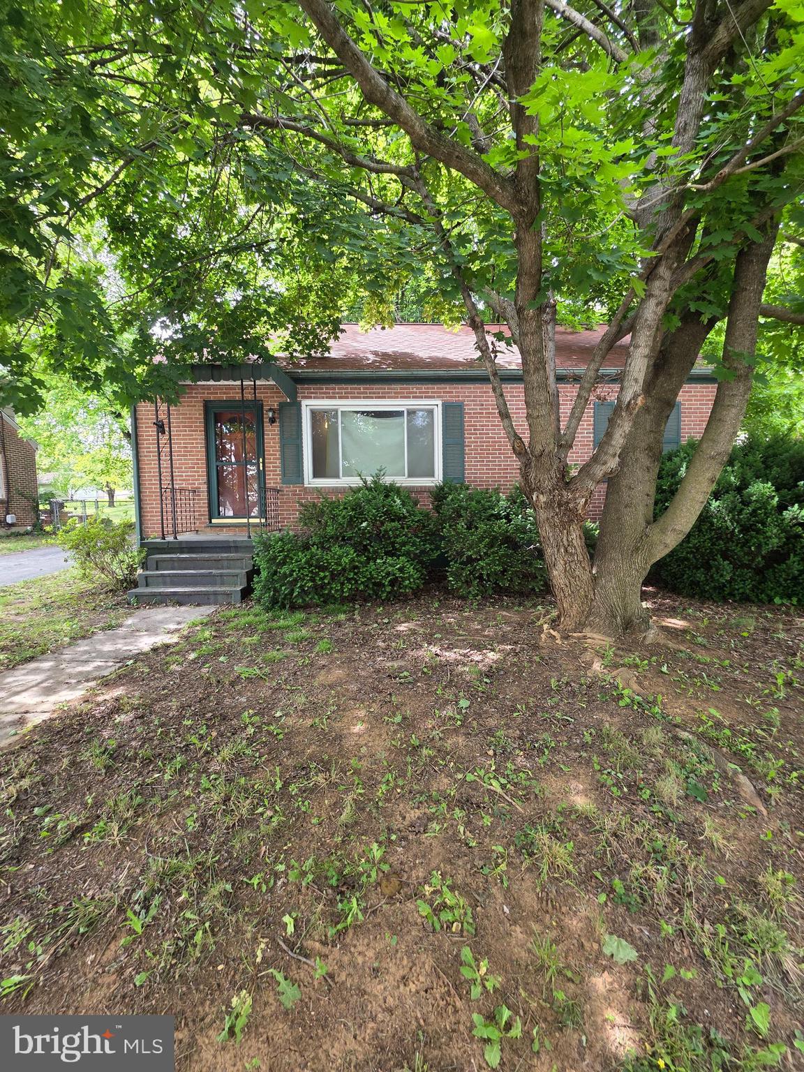 Welcome to your perfect starter home or downsizing dream. Nestled in a friendly Martinsburg neighborhood, this beautifully updated 2-bedroom, 1.5-bathroom home offers the perfect blend of comfortable indoor living and generous outdoor space.

Step inside to a bright, inviting living area filled with natural light, featuring low-maintenance flooring and a layout that maximizes every square foot. The kitchen is efficiently designed with ample cabinet space and flows seamlessly into the dining area, making it easy to cook and entertain. A screened  porch provides a quiet sitting area looking into backyard. 

Inside this ranch style home, you will find two well-appointed bedrooms with plenty of closet space, separated by a crisp, full bathroom. Both rooms offer a quiet, relaxing retreat at the end of the day.

The true highlight of this property is the expansive .29-acre lot. It is incredibly rare to find this much outdoor space in a home this size. The sprawling backyard is a blank canvas—perfect for summer barbecues, starting a large garden, setting up a fire pit, or simply giving pets a place to run.