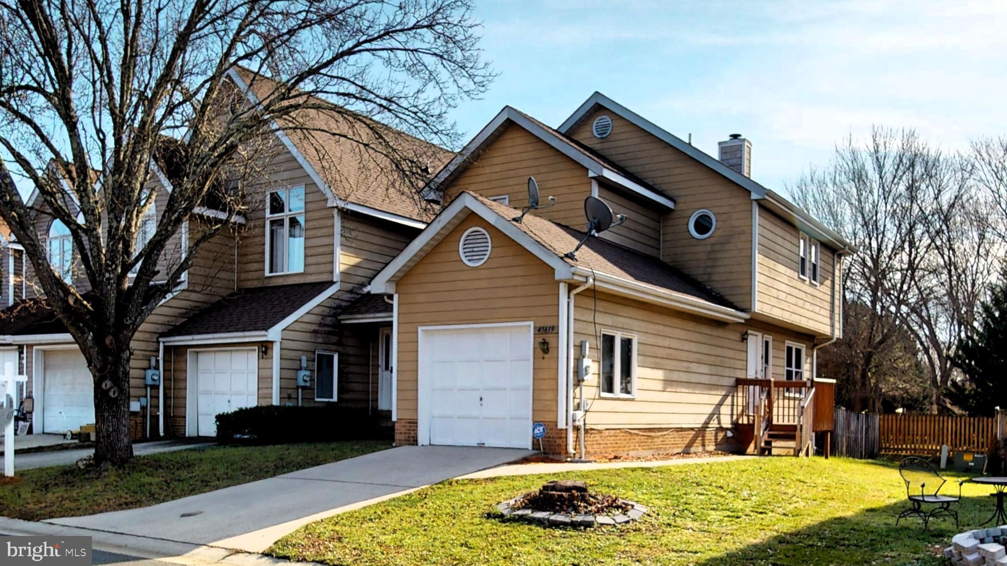This home is ready for immediate move-in.  House priced accordingly providing an opportunity to invest in potential house upgrades.  2024 is your season, make this home yours!  
Perfect location - Just minutes from PAX River Naval Air Station - Shopping - Local Restaurants.  This end-unit townhome includes a single-car garage.  The main level features a connecting living room and dining room with a welcoming fire place,  an eat-in kitchen and a convenient half bath.   A sliding glass door opens to the fenced backyard, providing a secure space for family gatherings or a safe environment for kids to play.   The spacious owner's suite features an ensuite, stunning cherry hardwood floors and a vaulted ceiling adorned with a ceiling fan.  The flooring in the upstairs hallway continues with stunning cherry hardwod.  The secondary bedrooms boast newer installed carpeting.  The basement includes a recreational room, laundry/storage area and a rough-in for a future bathroom.   
USDA eligible.