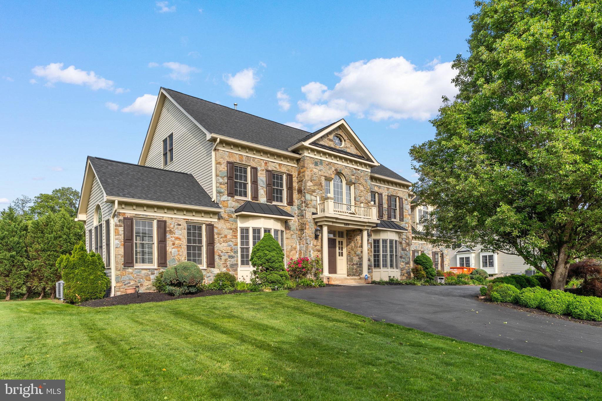Welcome to 16809 Harbour Town Rd—an estate-level residence backing directly to the golf course, offering incredible privacy, scale, and openness from the moment you step into the grand circular staircase foyer and into the soaring two-story family room filled with natural light; this beautifully refreshed 4-level stone-front Kenwood model features a fully updated kitchen with a striking quartz waterfall island and expansive entertaining spaces, complemented by 3 fireplaces, a custom oversized wet bar, and a sun-drenched solarium; the home offers 7 bedrooms, 2 dens, and a luxurious primary suite with cathedral ceilings, while a circular driveway and 3-car garage complete the impressive exterior presence; set on a premium golf course lot with endless space to live and entertain—this is true estate living, priced to sell and not to be missed.