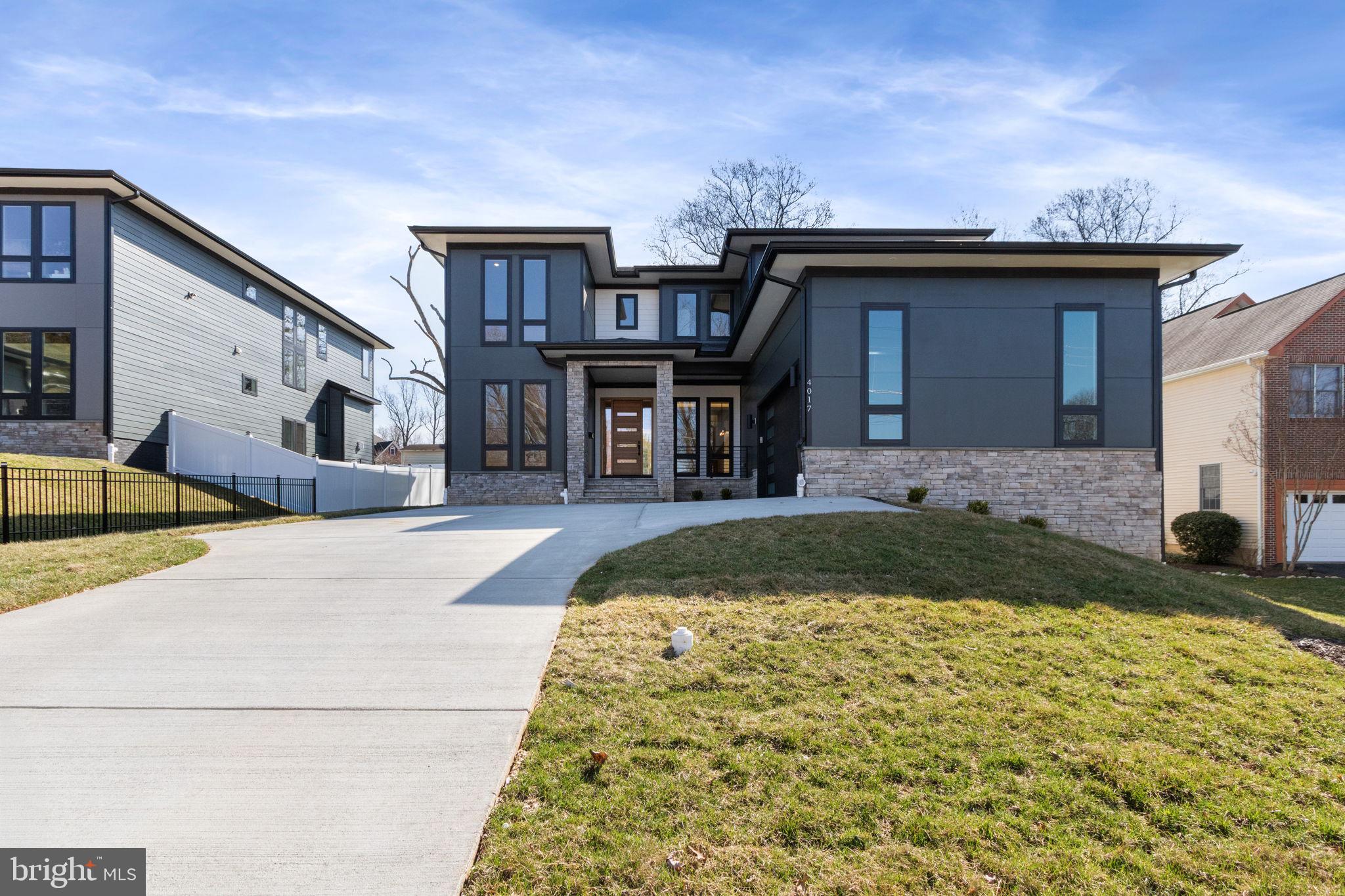 Project completed! This light-filled, exceptional new construction sits on a one-third acre lot inside the Beltway. Located at 4017 Woodland Dr, this stunning residence offers over 6,300+ sq ft of luxury living across three beautifully finished levels.

The main level features 10’ ceilings, a spacious great room with a tray ceiling, a chef’s kitchen with a butler’s pantry, a dedicated study/bedroom, and a mudroom complete with a built-in dog washing station.

The upper level showcases a grand primary suite with a spa-style bath, along with four generously sized bedrooms, each featuring walk-in closets and direct access to a bathroom.

The fully finished walkout basement is perfect for entertaining and everyday living, offering a media room, game area, gym, wet bar, and two full baths.

Situated on a quiet corner just minutes from popular shopping plazas, dining, and major commuter routes.