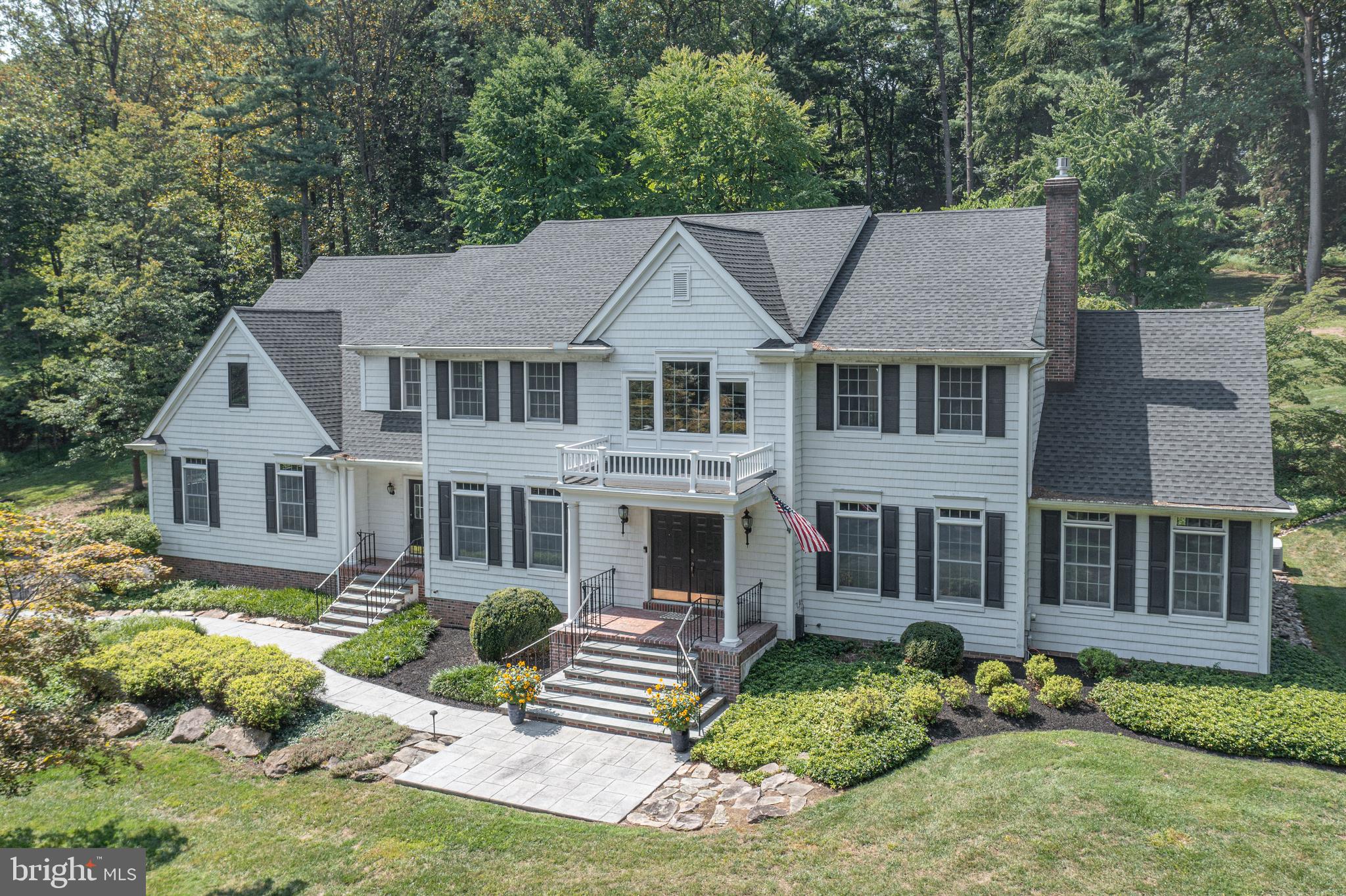 This prestigious colonial revival style home sits commandingly perched atop a gently sloping hill on 2.5 acres in the prestigious enclave of Bellinghamshire Estates. The drive up to your new home inspires awe each time you ascend to your 6,531 sq ft home which includes a finished basement of approximately 1,500 sq ft. Step up and into a turn-key home of timeless elegance and leave behind the delays, disruptions, and frustrations of attempting renovations yourself. From bedrooms to basement virtually the entire house recently received a grand makeover between 2023 and 2026. The three (3) original garage doors have been replaced with two larger overhead doors (one is 8’ x 11’ and the other is 11’ x 18’). The entire garage was updated and a new stair handrail and vastly enlarged landing platform leading into the home has been recently installed.  A dedicated split HVAC unit has been installed allowing the garage to be heated or cooled. All rooms have received beautiful new lighting fixtures including crystal flush mounts, sconces and recessed lights. The main floor foyer has a stately, large-scale wood chandelier. There’s also a new crystal chandelier installed in the backyard side living room. Newly installed and pristine, the carpeting throughout the house includes three staircases.  Additionally, two basement bedrooms received new carpeting two years ago and are both in excellent condition.Nearly every room including kitchen, sunroom, and bathrooms has been freshly painted with neutral designer colors by Benjamin Moore.  This includes the garage. The garage floor received epoxy floor treatment and finishing. The main front entry has stately double-size doors, a portico and brick steps and landing. The home is perfect for hosting friends and family in a multitude of rooms. Enjoy two living rooms, a sunroom, and a library which has doubled as a dining spot and for board/card games. Upon entering you’ll be greeted by a stately Louis XIV white/gray stone marble fireplace in the entry living room. The surround has been entirely updated with classic gray/white brick. The propane fireplace box has just been replaced with a stunning remote-controlled Mendota insert and is equipped a heat blower.  Another propane fireplace resides in the second living room. The stone facade is two stories high. It has been updated with six layers of variations of soft neutral tones of milk paint to give it a fresh airy feel. Sconces flank either side. This fireplace box has also just been replaced with a remote-controlled Mendota insert and heat blower. This room’s large French doors and windows open to the backyard. Recently renovated main floor powder room. There are two staircases allowing quick passage through the home with ease and convenience . The master bedroom was redesigned and now offers views to the lovely park-like backyard. A very large picture window was installed which is flanked by two additional windows on either side. Additionally, a sitting room was framed with a decorative transom above its wide entry door. A generous space which works for anything from an infant’s crib, home office,  yoga/stretch space and cozy reading room to an artist’s space as it provides glorious natural light. The master bath was entirely remodeled with a multitude of luxuries such as heated floors, Sonos audio system, Walker Zanger marble, WZ marble shower with Brizo (Delta’s luxury line) shower heads and jets and a clawfoot tub.  Restoration Hardware sink vanity, all styles of lighting: recessed, flushed, sconces, a Kohler toilet, and Anderson windows. The crown jewel is the New Ravenna Mosaic - a true art piece. Two of the three additional upstairs bedrooms have brand new built-in closet systems. The closet doors and the bathroom doors were newly replaced with solid wood pine doors. Two upstairs bedroom bathrooms have bidet toilet seats installed. Stacked LG washer/dryer on the 2nd level adjacent to all bedrooms.