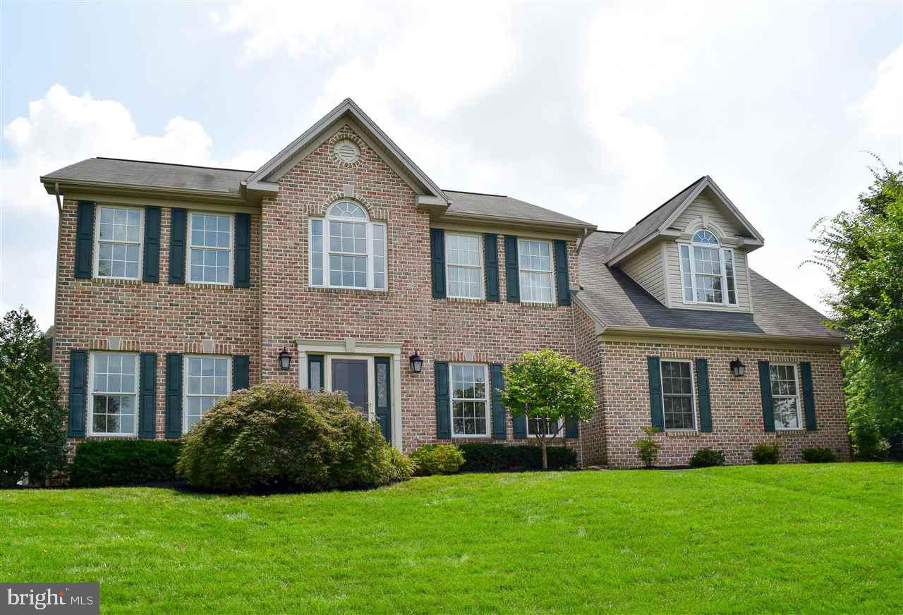 Elegant one-owner colonial spares no detail! Gourmet Kit w/ Wolf range, Sub-Zero fridge & wine chiller, island w/ prep sink. MBR w/ W-I closet & sumptuous BA w/ oversize glass shower & soaking tub. 1st Fl FR w/ gas FP, huge SunRm, generous BRs, W-O bsmt w/ 3 bonus rms, 2nd Kit & full BA. Vaulted ceilings, hdwd, granite, tile & premium amenities thruout. Must see!