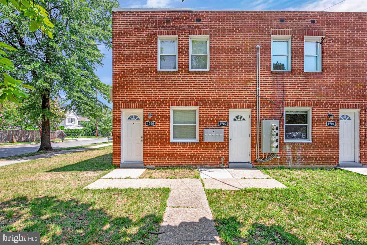This property is prime for investment as well as owner occupant.  Priced for full tenant occupancy at current market price for the area.  Room to build up and out. Ample yard space in the front, side and back of building.  Renovated units have updated flooring, updated appliances including washer and dryer.  Each unit is separately metered.  Front and back entrance for all units.   Updated roof and electrical service.  New doors and windows.  Three units fully updated.  Public transportation accessible, Deanwood Metro stop is one block away and the Stadium-Armory stop which will service the new stadium is two stops away. Close to downtown, museums, and shopping.  Close distance to Route 50, Baltimore Washington Parkway (295) and New York Avenue.