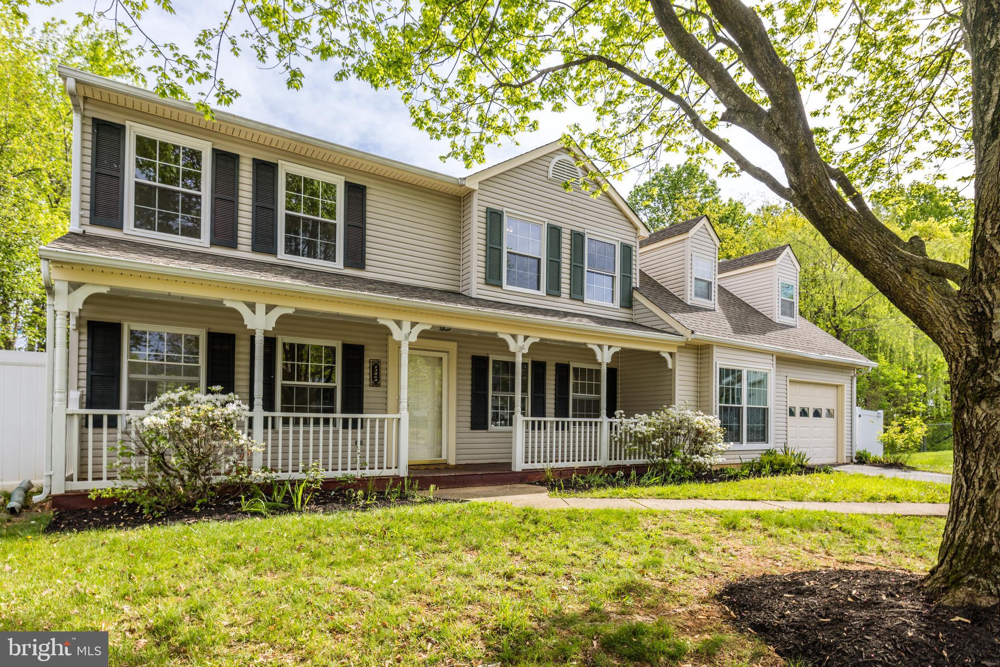 For Lease - Showings starting 5/3/25 Welcome home to this picturesque storybook Colonial, full of timeless charm in a light, airy, modern floor plan! Nestled on a quiet cul-de-sac, this lovingly maintained home sits on nearly half an acre of landscaped grounds, offering the perfect blend of privacy and convenience near schools and major roads. You’ll immediately love the classic covered front porch, an inviting spot to welcome guests or spend leisurely afternoons. Enter inside to discover versatile living spaces, including a large living room, family room, and separate formal dining area, each thoughtfully designed for both entertaining and everyday living. Beautiful hardwood floors add an elegance and warmth throughout the main level, while upstairs features brand new, durable luxury vinyl wood-look flooring. The heart of the home is the updated eat-in kitchen, featuring chic contemporary countertops, a stylish tile backsplash, large stainless-steel Whirlpool fridge, and a brand new oven. The upgraded pantry with butcher block countertop provides even more storage and prep space. Just off the kitchen, the spacious family room beckons with a cozy gas fireplace and classic chair-rail molding. French doors beckon to your tranquil outdoor living space, where a large deck with built-in seating overlooks the expansive lawn, perfect for relaxing and entertaining. Retreat upstairs to your palatial primary suite, complete with a private sitting area under soaring cathedral ceilings - easily doubling as a work-from-home office or nursery - as well as three closets and a luxurious en suite bath with a soaking tub and separate shower. Two additional bedrooms, each with a ceiling fan, two full baths, and a thoughtfully placed half bath near the front entry offer comfort and convenience for family and guests. One-car attached garage plus tons of additional storage with two sheds on the property. Freshly painted and landscaped, this home is ready and waiting to welcome you. Offering comfort, style, and location, this one checks all the boxes!