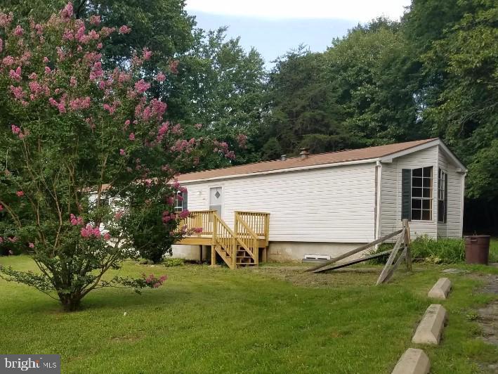 3-bedroom, 2-bathroom home by a serene back road.  A perfect blend of rustic and convenience.  Has a detached garage, sold as-is.  Instead of a tiny crawlspace, this has a long, tall unfinished basement with interior and exterior access for lots of storage, or possibly finish it.  Also fire pit, horseshoe pits, extra fridge in the garage...  Who likes to chill by the campfire?

New HVAC and Water Heater. Newer Well Pump, fridge, toilets, roof, and gutters.  It is not freshly painted and seller will not do cosmetic improvements - but priced accordingly.