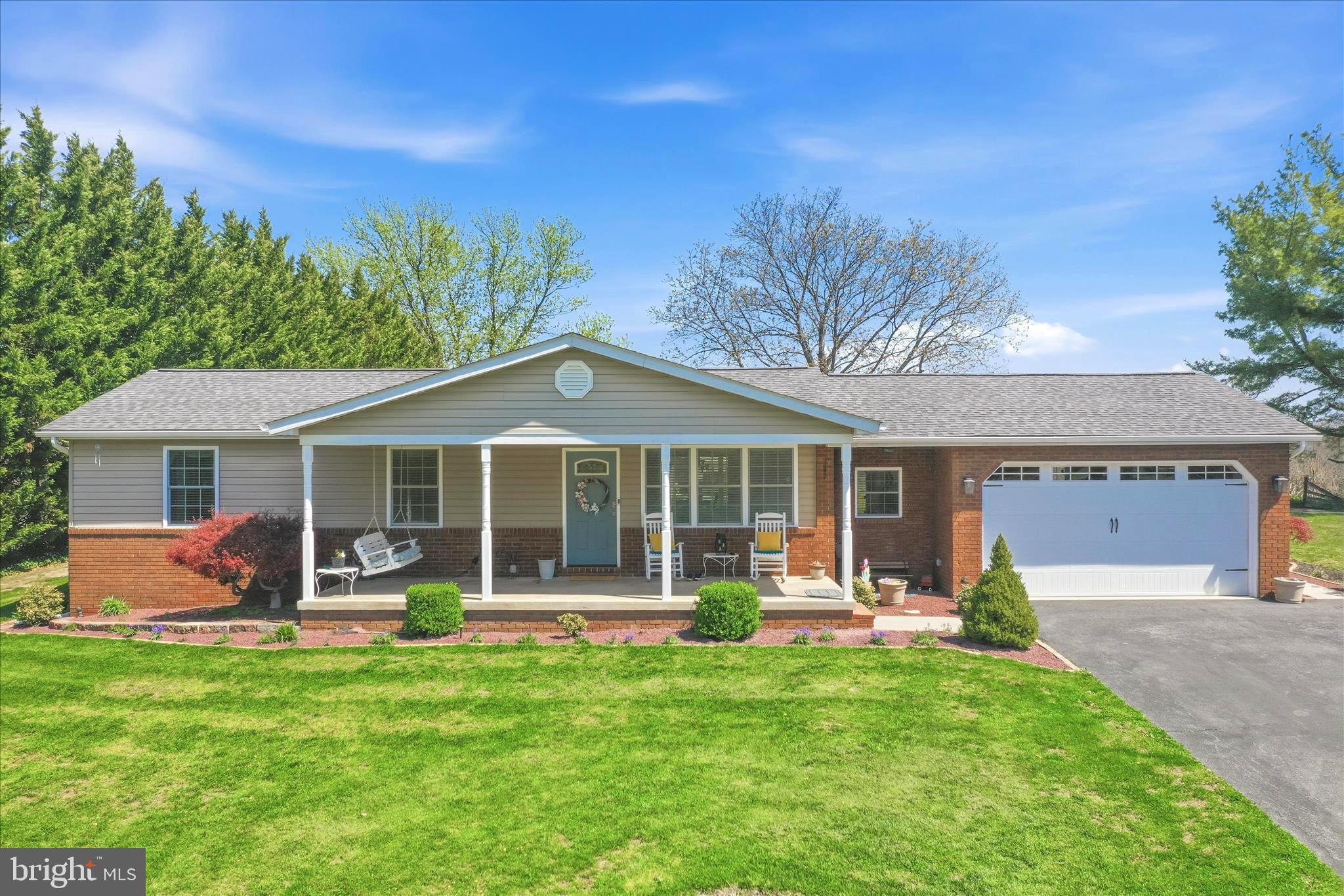 OPEN HOUSE SAT 6/13 12pm-3PM! MOTIVATED SELLERS! PRICE REDUCTION!  LOCATION! LOCATION! RARE OPPORTUNITY! METICULOUSLY KEPT 1 OWNER 3 BR, 2BA RANCHER  WITH 2 CAR GARAGE AND A DETACHED 30X40 2 BAY GARAGE WITH OVER 3,300 SQFT OF LIVING SPACE! FEATURING: LARGE FRONT PORCH WITH BEAUTIFUL LANDSCAPING.  NICE SIZE LIVING ROOM WITH HARDWOOD FLOORS FLOWING INTO DINING AREA WITH SLIDING GLASS DOORS OVERLOOKING A  LARGE COVERED PORCH FOR RELAXING OR ENTERTAINING. BREATH TAKING VIEWS OF PASTURE, MOUNTAINS AND VALLEY GO ON FOR MILES! BEAUTIFUL MAPLE KITCHEN WITH GRANITE COUNTERTOPS AND STAINLESS STEEL APPLIANCES. NEWER LAUNDRY ROOM  OFF DINING AREA WITH BUILT INS LEADING OUT TO BACKYARD OR GARAGE. NICE SIZE PRIMARY BEDROOM WITH ATTACHED BATH. ADDITIONAL 2ND BEDROOM AND 2ND BATH FINISH UP THE MAIN LEVEL. MOVING DOWNSTAIRS TO A FULLY FINISHED BASEMENT. HUGE REC ROOM WITH CERAMIC FLOORING AND SEPARATE CARPETED AREA  WITH CEILING FAN. A SUPER BIG 3RD BEDROOM WITH PLENTY OF CLOSET SPACE AND CERAMIC FLOORING. UTILITY ROOM WITH BUILT INS AND PLENTY OF CLOSETS FOR STORAGE. THIS IS TRULY A RARE OPPPORTUNITY TO OWN A PROPERTY WITH NOTHING TO DO BUT MOVE IN! DON'T MISS OUT THIS ONE WILL NOT LAST LONG!