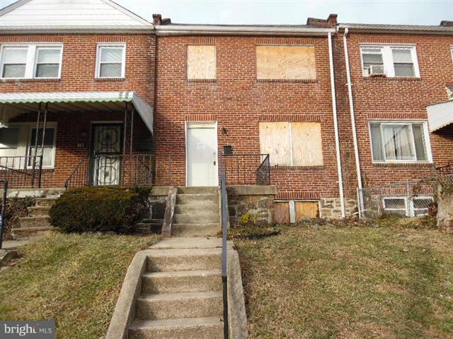 All Brick interior row home offers three levels of living space. Home was in process of renovations. Open floor plan on main level. Upper offers 3 bedrooms and 1 bath. Full lower level with 1/2 bath and laundry area. Walk out level to back yard with driveway to 1 car garage in basement . O Agents view docs on the mls for contract details.
