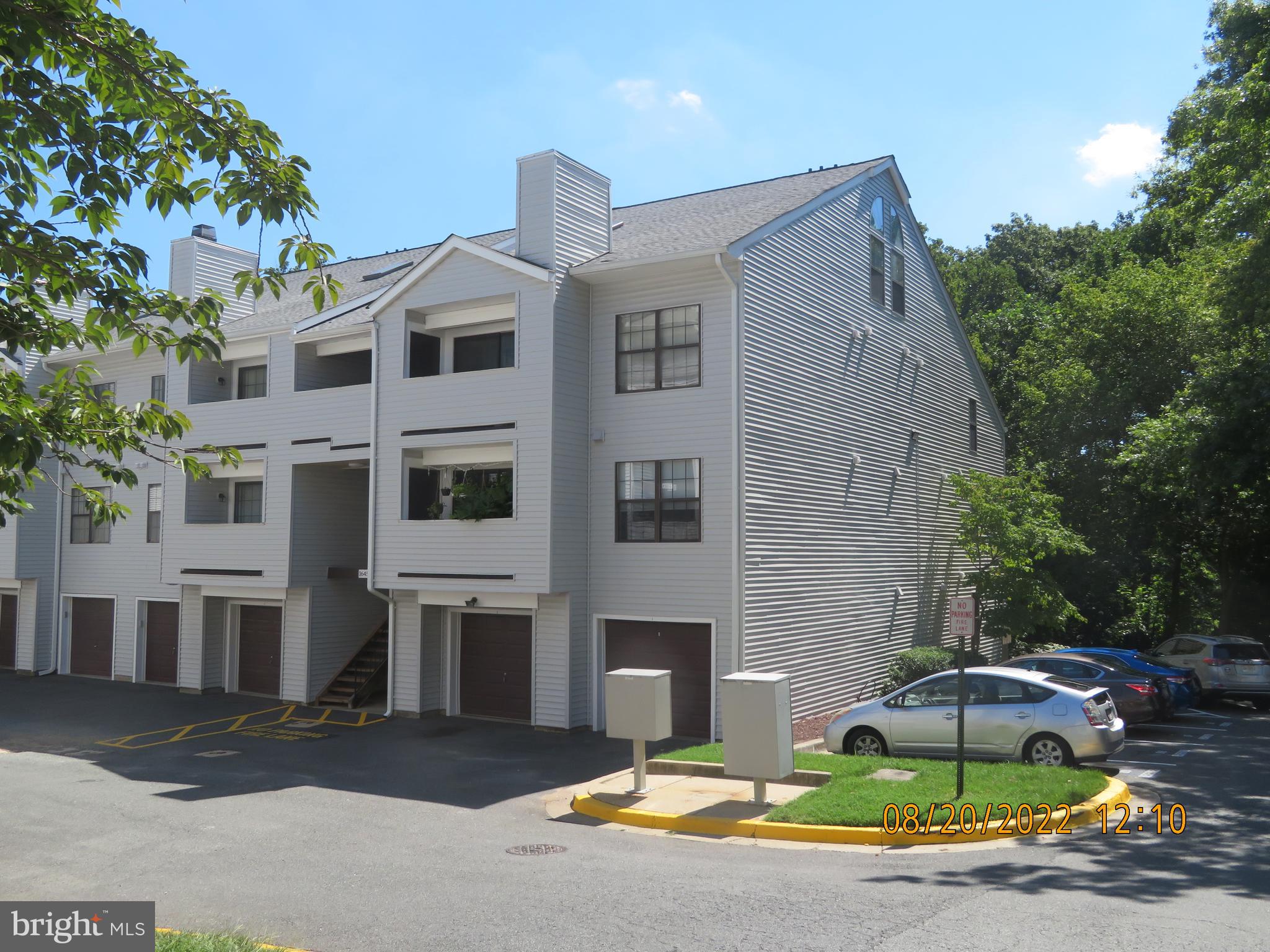 Lovely ground floor unit facing the Park, assigned parking [75], living room with access to enclosed patio, newly remodeled kitchen, washer and dryer within unit, amble closet and storage space.  Convenient to local shopping and public transportation, just South of the ICC, walk-able community.