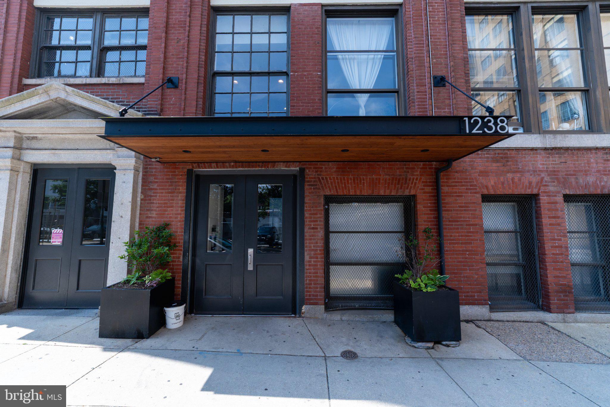 Nestled in the heart of the prestigious Callowhill neighborhood, this exquisite penthouse unit offers a unique blend of historic charm and modern sophistication. Built in 1900, this loft-style apartment is a true gem, showcasing the timeless elegance of masonry construction while providing an inviting atmosphere that feels like home. As you step inside, you are greeted by soaring ceilings and expansive open spaces that invite creativity and comfort. The layout is thoughtfully designed to maximize natural light, creating a warm and airy ambiance throughout. With a full bathroom elegantly appointed, this space is perfect for those seeking a luxurious urban retreat. The kitchen, while currently awaiting your personal touch, offers the potential for a culinary haven where you can craft gourmet meals or enjoy casual dining. Imagine hosting intimate gatherings with friends, surrounded by the character and charm that only a historic building can provide. The penthouse's location in Callowhill places you at the center of a vibrant community, where art, culture, and culinary delights are just steps away. Explore trendy cafes, boutique shops, and art galleries that define this dynamic neighborhood. The convenience of city living is at your fingertips, while the serene atmosphere of your loft provides a peaceful sanctuary to unwind after a busy day. This property also features the convenience of washer and dryer hookups, ensuring that modern living meets your lifestyle needs. While parking is not included, the accessibility of public transportation and nearby amenities makes this location ideal for those who appreciate the hustle and bustle of city life. Experience the allure of loft living in a historic setting, where every detail speaks to a lifestyle of elegance and comfort. This penthouse unit is not just a place to live; it's an invitation to embrace a life filled with style, culture, and community. Don't miss the opportunity to make this exceptional space your own and enjoy all that Callowhill has to offer.
