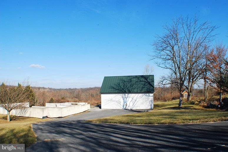 Beautiful 5.31 Ac with 2 Car Over sized Garage with storage room Metal roof. Foundation for home next to Garage . Property sold strictly as is .Owner occupant offers accepted until First look initiative expires 3-22-18. Home Sitting on VA /WV line . Has WV Tax Record and VA Address . Septic and well on property LA has no reports ,Buyer to confirm .