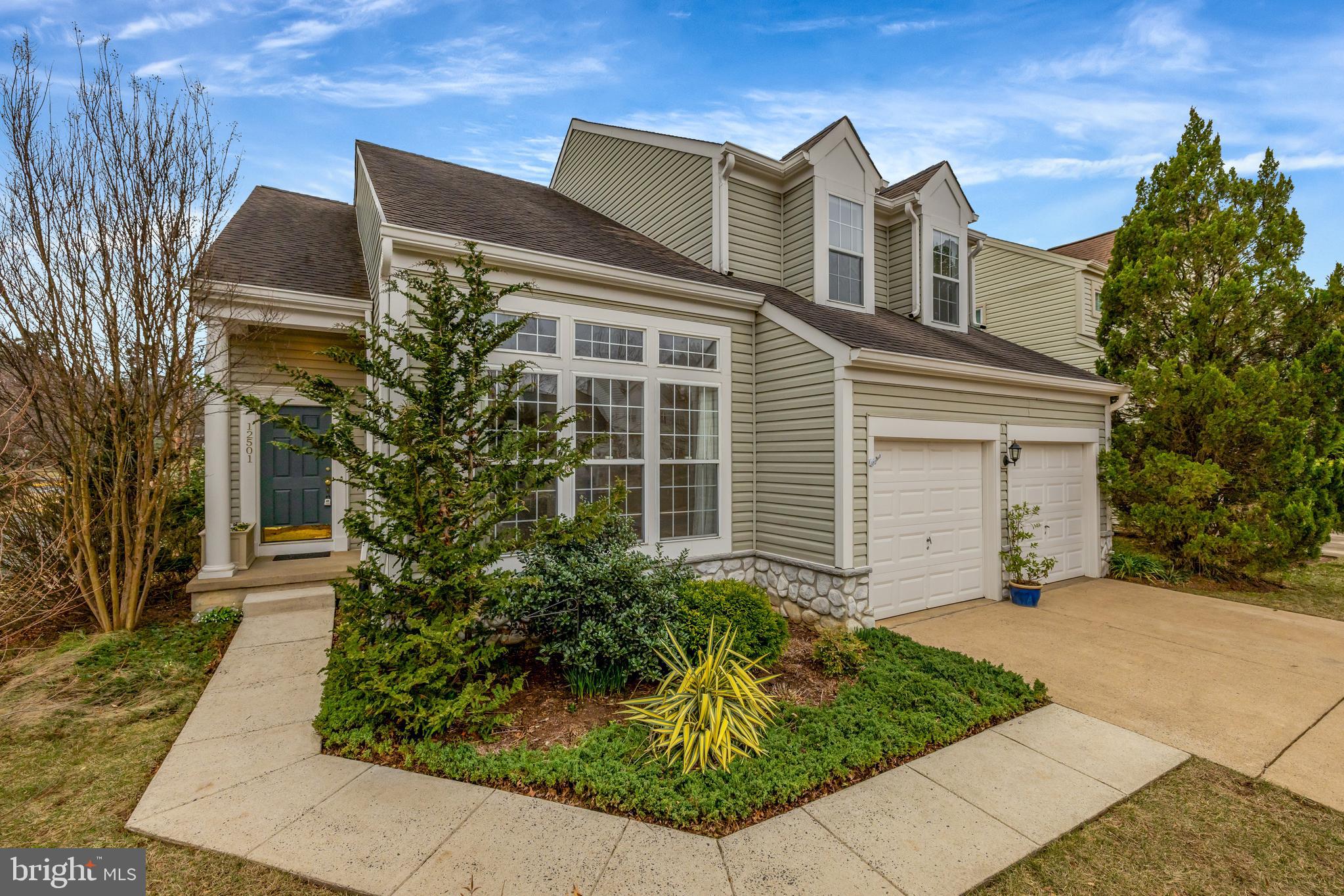 OFFERS DUE TUESDAY, MARCH 18 AT 12PM. This gorgeous contemporary home is ideally located in the highly sought-after Reston area, between Reston Parkways and Fairfax County Parkway, with short distance from the Fox Mill Shopping Center, Reston Town Center, and the RTC Metro Station. Beautifully landscaped on corner lot in friendly small HOA of 115 homes.  The open floor plan allows an abundance of natural light to flow throughout the home, creating a bright and airy atmosphere. The MAIN LEVEL MASTER SUITE features a raised ceiling, a spacious walk-in closet, and an en-suite bath with both a shower and a tub for ultimate relaxation. The living room, with its soaring vaulted ceilings, adds a touch of elegance, while the formal dining room is perfect for hosting gatherings. The open kitchen, complete with an island and a breakfast room, overlooks the family room, which is highlighted by a cozy gas fireplace. The large deck off the back is ideal for entertaining, providing ample space for outdoor enjoyment. A convenient mudroom off the 2-car garage offers additional functionality. Upstairs, you’ll find two bedrooms, a full bath, and a loft area that can be customized to suit your needs. The unfinished lower level offers a fantastic opportunity to create your dream space, ready to be tailored to your preferences. **UV light installed 2024,  new electrical panel and house surge protector installed Nov 2020, Furnace, humidifier and AC replaced 2017.**
