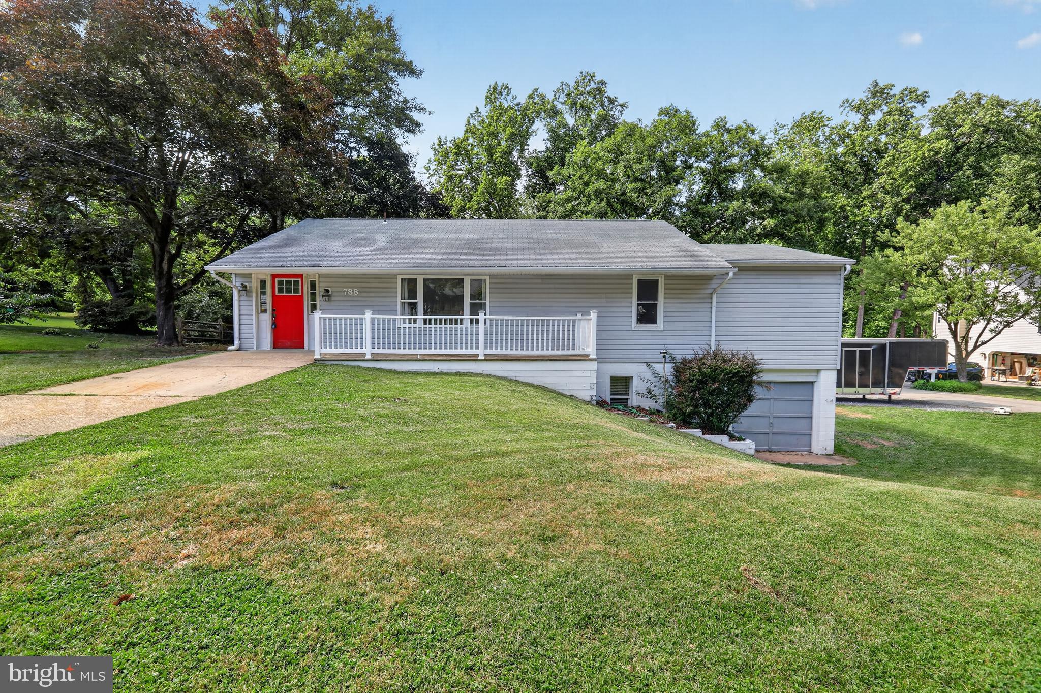 RARE CROWNSVILLE FIND WITH NO HOA! Unmatched RV infrastructure, prime location, and the freedom to use your property your way. Whether you are seeking space for your toys, a commuter's dream, or a solid canvas to build immediate equity, this home delivers.  

EXTERIOR & UNRIVALED PARKING: Bring your Class A motorhome, heavy-duty toy hauler, or boat! With zero HOA rules dictating what you can park, this property is a rare haven. This property boasts two dedicated RV parking spots with full, turnkey utility connections. Spot 1 features an integrated 50/30/20-amp electrical box, water spigot, and direct sewer cleanout/dump station. Spot 2 offers a 50-amp connection, water, and a sewer dump. Two versatile outbuildings/sheds are already equipped with power and water —perfect for a future workshop or studio. Out back, a leveled 16’ circular clearing is waiting for your trampoline or custom fire pit.

INTERIOR & SYSTEMS: The home is designed for easy access, featuring a zero-step entry and a 36” front door, plus the convenience of a first-floor washer/dryer and a relaxing Jacuzzi tub. The kitchen features an RO drinking water system tied directly to a massive 31 cu. ft. mega-capacity refrigerator. Upstairs, the primary bedroom is equipped with a dedicated mini-split system for precision, year-round climate control with immaculate views. Verizon FIOS is available, making work-from-home a breeze.

THE OPPORTUNITY: With robust infrastructure and solid mechanical systems already in place, this home is being sold As-Is—presenting the perfect opportunity to bring your own cosmetic updates and build instant equity in a highly desirable zip code.

UNBEATABLE LOCATION: Nestled in a quiet, single-entry neighborhood with mature trees, well-cared-for lots, and zero through-traffic. You are steps away from outdoor recreation: located just across I-97 from the renowned Bacon Ridge Natural Area trail system, and right across Generals Highway from a major planned public park (South Shore Park). A convenient school bus stop right in front of the house makes the morning juggle a breeze. Enjoy ultimate privacy with a lightning-fast commute to Ft. Meade, the US Naval Academy, BWI, Baltimore, and the DC/College Park corridor.
Some images may reflect virtual staging or digital editing, including removal of personal property, to help showcase the home.