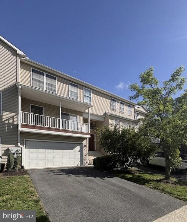 Welcome home! You won't want to miss this turnkey 3 bedroom townhome. As you enter, the two story foyer will greet you. The spacious living room has an abundance of natural light. It will be a great space to hang out with family or friends. The kitchen and dining area have a sliding glass door that leads to the covered deck- making entertaining  a breeze. The kitchen boasts an island and ample counter space which will be ideal for food preparation. A half bath rounds out the first level. Retire to the spacious primary bedroom with an ensuite and a walk-in closet- sure to please shoppers! Two additional good size bedrooms, a full bath with a tub shower and laundry are conveniently  located on the second level. The finished first level could be used as a home office, a family room, an exercise area or whatever suits your needs. An attached two car garage will save you from scraping snow and ice from your vehicle. If you enjoy outdoor living, the patio will be the place for you! Read a good book or soak up some sunshine. The HOA will take care of lawn maintenance and snow removal- low maintenance living!
Conveniently located close to local shops and restaurants, schedule your showing today!