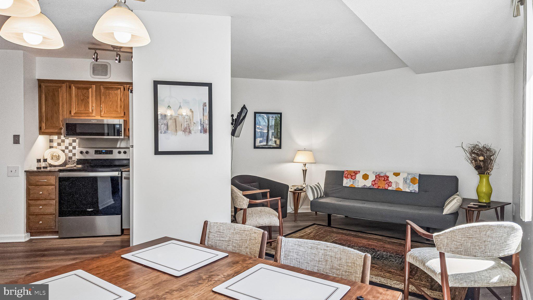 Renovated junior one bedroom at Academy House with sunrise views steps from Avenue of the Arts and Rittenhouse Square. Enter through a welcoming foyer with large coat closet into the renovated kitchen offering ample wood cabinetry, granite countertops, tile backsplash, pantry closet, and a full suite of stainless steel Whirlpool appliances. The open great room has ample space for living and dining and oversized windows showcasing sunrise views over Academy House’s landscaped courtyard. The generously sized bedroom is showered in light from another large window and has a deep wall closet. Adjacent is an updated hall bathroom with modern vanity, tub shower, and upgraded tile floor. There are vinyl floors and excellent closet space throughout. Move right in and enjoy everything that Center City Philadelphia has to offer! Residents of Academy House enjoy a 24-hour doorman and a state-of-the-art fitness and aquatic center. There is valet parking in the building's garage for an additional monthly fee, subject to availability. The Academy House is located in the heart of Center City and within close walking distance to Rittenhouse Square, Washington Square, and the Broad Street and Market Street office corridors. The Philadelphia International Airport and Amtrak's 30th Street Station are easily accessible.  All utilities are included; there is only an additional fee for monthly cable and internet through the building.