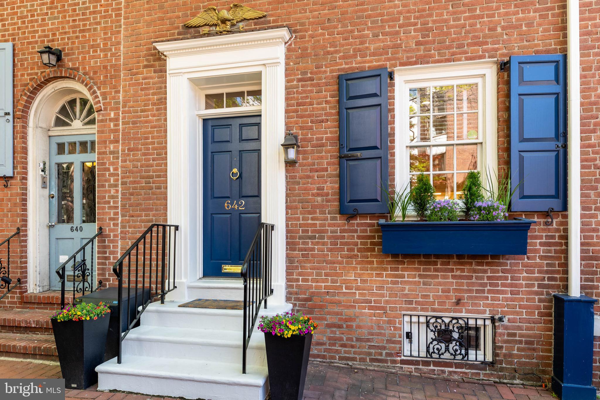 Welcome to 642 Pine Street, a beautifully updated historic residence in the heart of Philadelphia’s highly coveted Society Hill neighborhood. Blending timeless architectural charm with thoughtful upgrades, this exceptional home offers an expansive layout featuring 4 spacious bedrooms, 2.5 bathrooms, and a versatile lofted den space perfect for a primary suite retreat, home office, playroom, or additional family room. Step inside through the inviting foyer, complete with a large coat closet, and immediately appreciate the character and craftsmanship throughout. Rich hardwood floors and beautiful millwork create warmth and sophistication across every level. The beautifully renovated kitchen is designed for both everyday living and entertaining, featuring premium Sub-Zero and Wolf appliances, quartz countertops, designer tile flooring, and abundant storage. The open living and dining area is truly the heart of the home, centered around a stunning fireplace with marble surround, custom woodwork details, and built-in shelving. French doors lead seamlessly to the private outdoor garden, creating the perfect indoor-outdoor flow for entertaining, complete with a charming garden shed for additional storage. The second floor offers two generously sized bedrooms with excellent closet space, along with a beautifully appointed hall bathroom featuring a dual vanity and marble-tiled shower. The top floor includes two additional large bedrooms plus the spacious lofted den area, offering endless flexibility for today’s lifestyle needs. The newly updated finished basement adds even more living space with high ceilings, making it ideal for a home gym, media room, playroom, or additional entertaining space, along with a dedicated laundry area and extra storage. Recent improvements include a refreshed exterior façade and backyard shed, updated primary bath, basement waterproofing and exterior parging, upgraded 200-amp electrical service, recarpeted stair runner, designer wallpaper in the basement and powder room, and updated hardware throughout. Enjoy the unmatched walkability of Society Hill, just blocks from Washington Square Park, Head House Square, the Sunday Farmers’ Market, Talula’s Garden, Stella Pizza, Acme, and countless neighborhood favorites. Convenient access to public transit, I-95, and 676 makes commuting effortless, while being located within the highly sought-after McCall School Catchment. As an added bonus, the seller will provide one year of prepaid PARKING, with several convenient neighborhood garage options just steps away. A rare opportunity to own a truly special home in one of Philadelphia’s most desirable and historic neighborhoods.