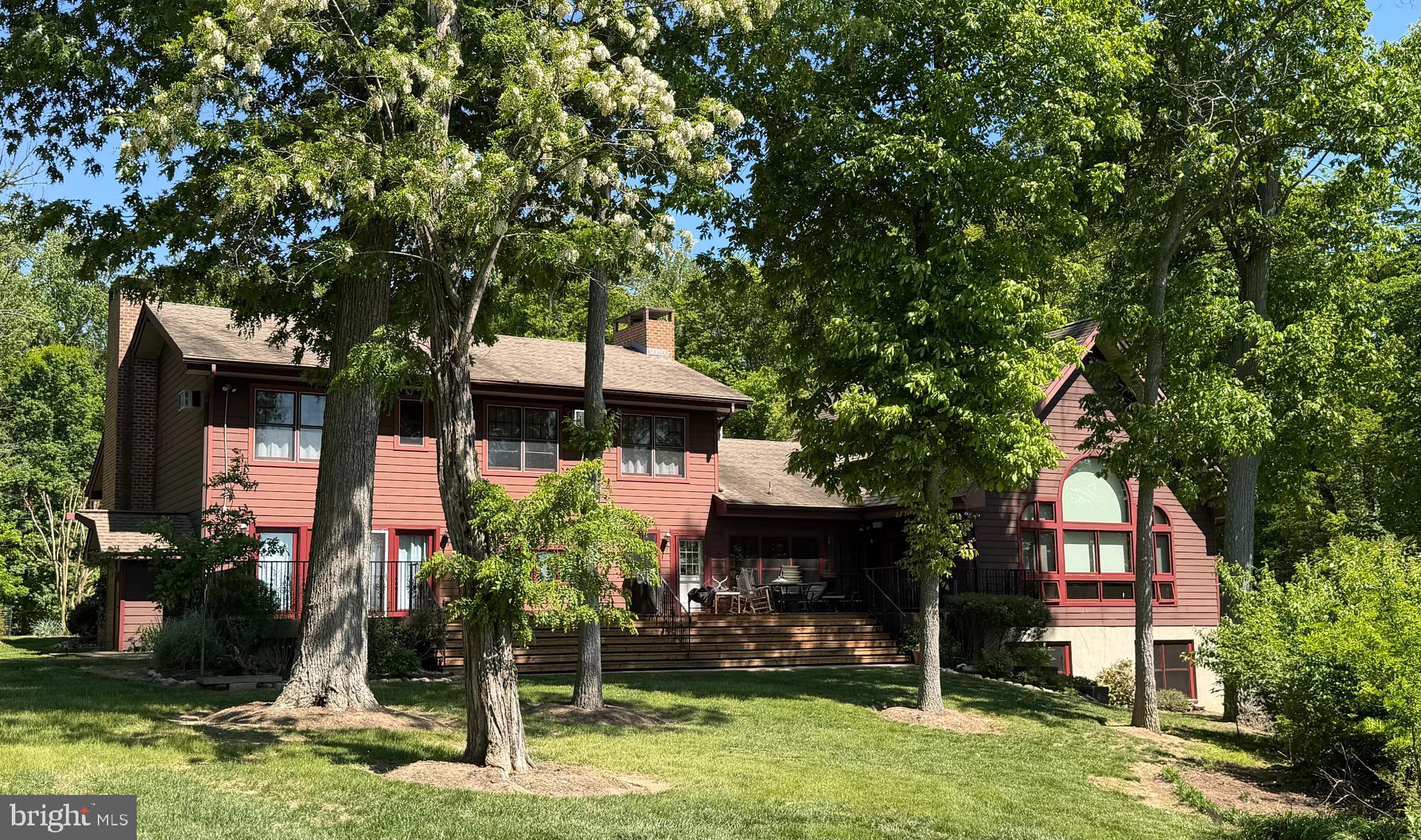 Coming Soon! 
Welcome to 22470 Fairgale Farm Ln, a spacious home and property perched over Fairlee Creek, with a deeded boat slip.  3.55 acres, partly wooded, exceptionally landscaped, and perfectly framed water views. Walk down to the water to enjoy the views or launch a kayak.  The deeded deep-water boat slip, outfitted with a boat lift, is just a short distance away.
The home features 4 bedrooms and 5 full bathrooms, plus a large loft that could be an additional bedroom. The large eat-in kitchen has expansive windows that perfectly frame the water view. A great spot for entertaining! Doors in the kitchen lead to the waterfront deck, spanning the front of the home. 
In both sitting rooms, you’ll find fireplaces that have been conveniently updated to propane. The first-floor primary bedroom opens up to the waterfront deck and offers a fantastic water view, as well as a large bathroom that was recently updated. 
Upstairs you’ll find two waterfront bedrooms, one with an updated attached bath. There's a second full bathroom  and ample closet space in the hallway. 
Downstairs, there are two additional full bathrooms and a bedroom. Above the kitchen sits the light-filled loft, a great office, studio, or extra bedroom. 
The exterior has a generous front porch, outdoor shower, circular drive, 2-car garage, fenced dog run, and additional garage space connected to the basement. 
This light-filled waterfront property is located 15 minutes away from the waterfront community of Rock Hall and historic Chestertown.