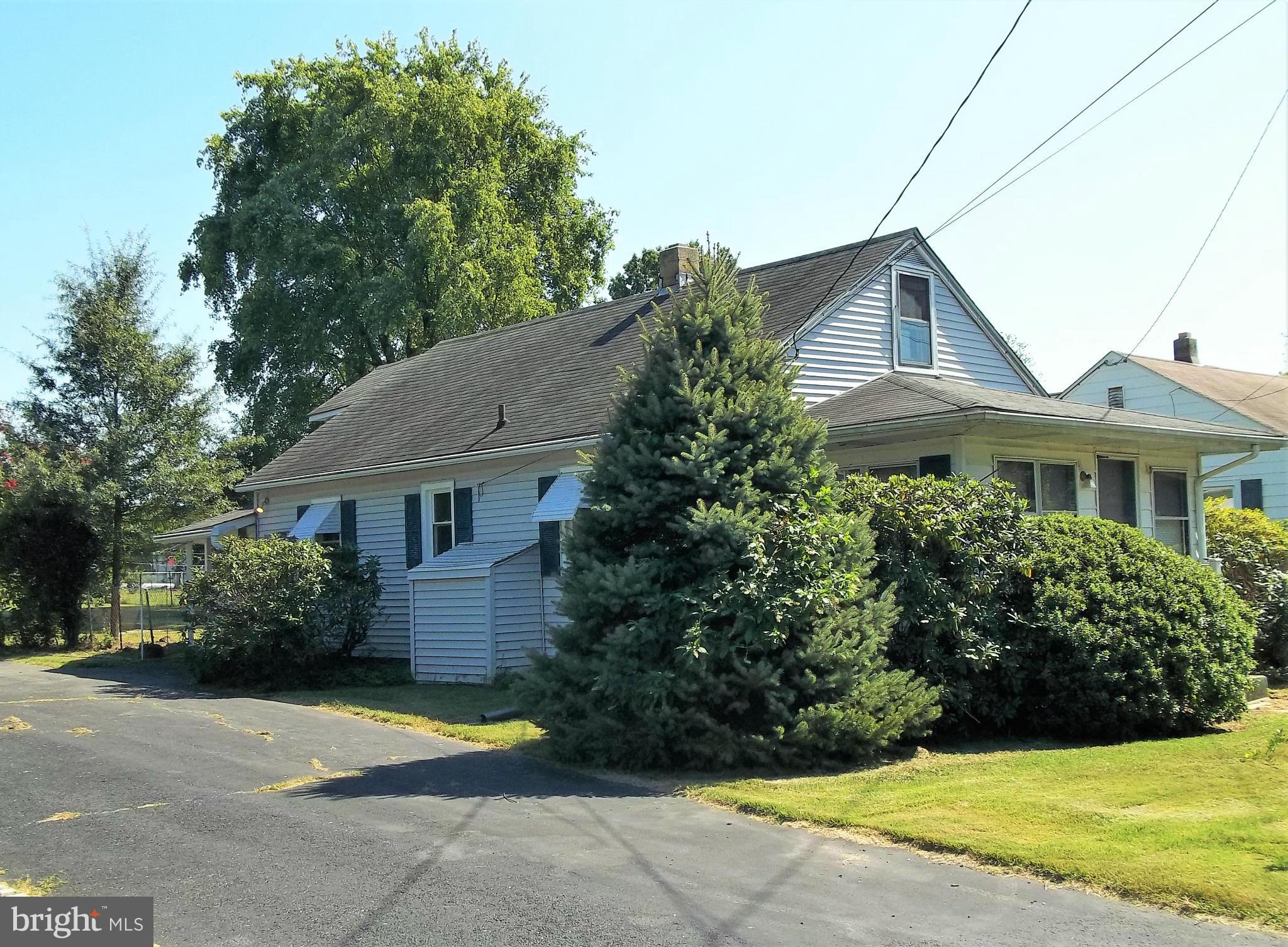 Great Price for this 2 BR, 1 bath house. Selling "as is", no FHA or VA contracts. New Kitchen, most windows replaced, washer & dryer included, attic is floored, partial basement, enclosed front and back porches. HMS Warranty. Large back yard & off street parking. Has CAC & window unit. If you are a handy man or woman, this could be quite charming with a little TLC! Seller wants it sold!