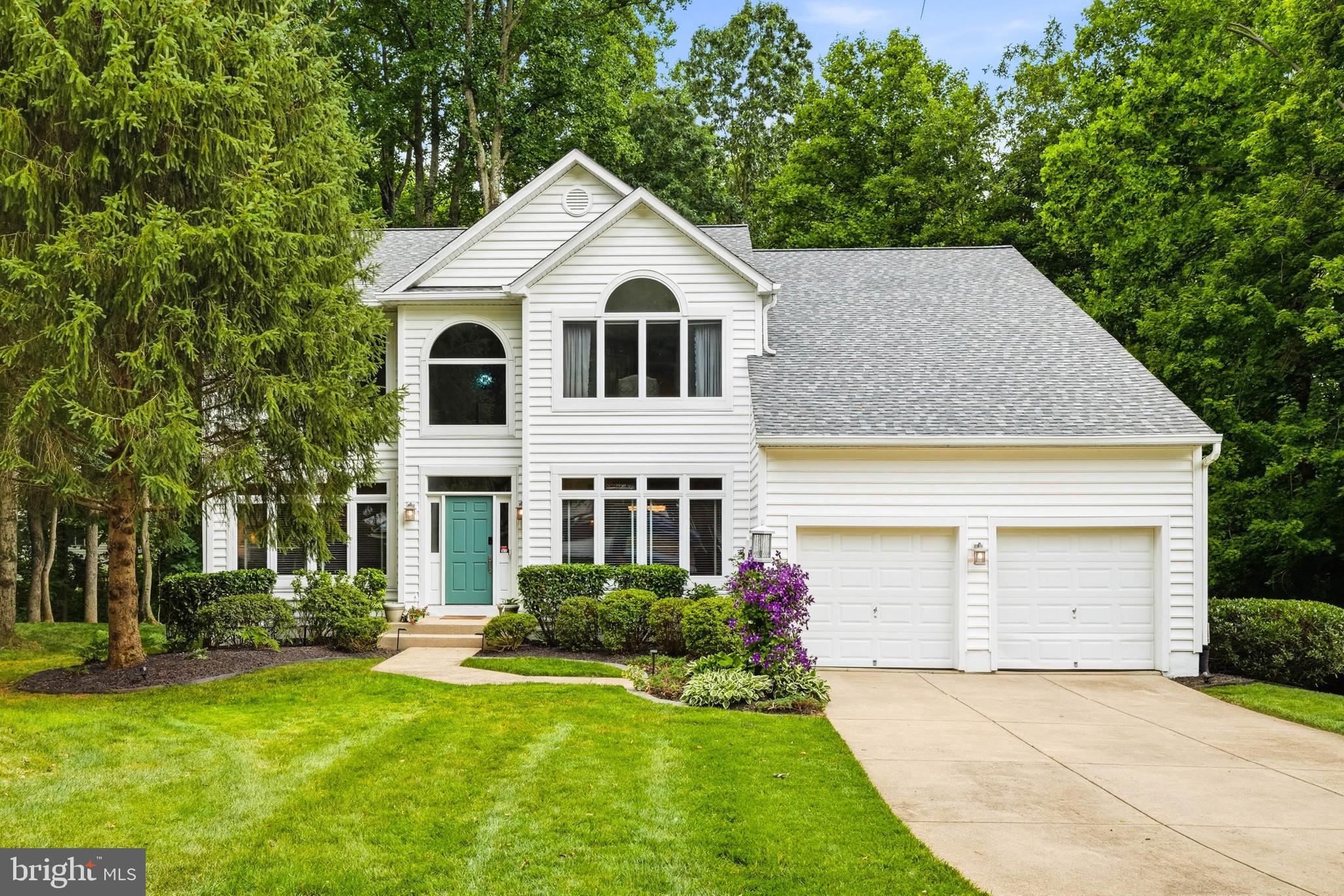 Welcome to this beautifully updated home in sought-after River Hill. Tucked away on a quiet cul-de-sac and backing to mature woods, this property offers a rare combination of privacy, space, and extensive updates throughout.

The main level features soaring ceilings, abundant natural light, a renovated gourmet kitchen with granite countertops, updated cabinetry, stainless steel appliances, and a spacious island that opens to the family room with fireplace. A private office, formal dining room, sunroom, and flexible living spaces provide room for both everyday living and entertaining. Upstairs, the spacious primary suite offers a sitting area and renovated spa-inspired bath, while the additional bedrooms and updated baths provide plenty of room for guests.

The finished walkout lower level includes a large recreation area, wet bar, bedroom, full bath, exercise space, and storage. Outside, enjoy the expansive multi-level deck overlooking a private wooded backdrop and a level backyard ideal for relaxing or entertaining.

Major updates include a new roof (2026), HVAC systems (2023), backyard clearing and grass installation (2024), windows and siding (2015), renovated basement (2018), updated bathrooms (2019), renovated kitchen (2020), refinished hardwood floors (2020), tankless water heater, and recirculating system. Prepaid landscaping services through the end of 2026 convey with the property.
