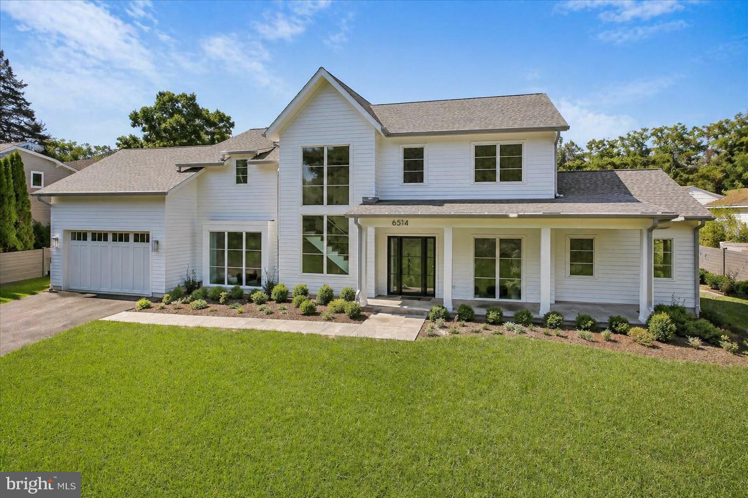 Welcome to 6514 76th Street, built by Patrick K. Keating & Company and Kehoe Construction and designed by GTM Architects! This exquisite luxury home is handicap/wheelchair accesible, boasts 6 bedrooms, 5 full bathrooms, 2 half bathrooms and over 6,100 sq ft of finished living space and is situated on an oversized ½ acre lot in the lovely Cabin John Park neighborhood.

The exterior has a peaceful color palette, a stunning staircase silhouette as viewed through the front window, a two-car garage and an enormous flat, fenced private backyard with a screened porch and patio and it is ready for a pool!

The open and spacious floor plan features elegant, modern craftsman touches everywhere including kitchens and baths designed by Jack Rosen Custom Kitchens and large windows for plenty of natural light! Flush doors at entry and curbless showers throughout the house make this home easily wheelchair accessible!

There is also an option for an elevator!

On the main level you will find an inviting living room, formal dining room, butler’s pantry, family room perfect for entertaining with a multi glide door to the back porch with retractable phantom screens, built ins and a linear gas fireplace with custom designed surround detail, a gourmet kitchen with a center island, and breakfast area, a mud room, two powder rooms and an in-law suite with a full bathroom!

A statement staircase in white oak takes you up to the gorgeous upper level that includes a large relaxing primary suite with expansive custom designed walk-in closet and a spa bathroom with heated floors, a freestanding bath, oversized shower, two vanities and a makeup station. Also included on the upper level are 3 additional bedrooms, 2 additional bathrooms and a laundry room with a sink and cabinets and air-conditioned attic storage.

The lower level includes an oversized recreation room with a wet bar, an exercise room, a bedroom with a walk-in closet and a full bathroom and a finished storage room.

Great location in the Whitman High School District and convenient to the beltway, Washington D.C. and Bethesda. Trailhead access is steps away to take you down to the C&O Canal.