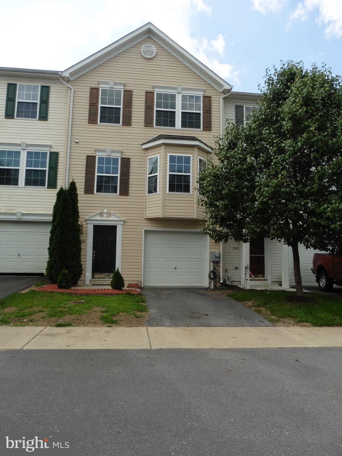 Low maintenance home with upgraded flooring. Entry into main level with finished family room to entertain and garage. Wonderful, large living area with fireplace and bump-out made for a reading nook. Kitchen island, deck - it's all here! Great location - Just minutes to I81 for easy commuting, near new Amazon and P & G.