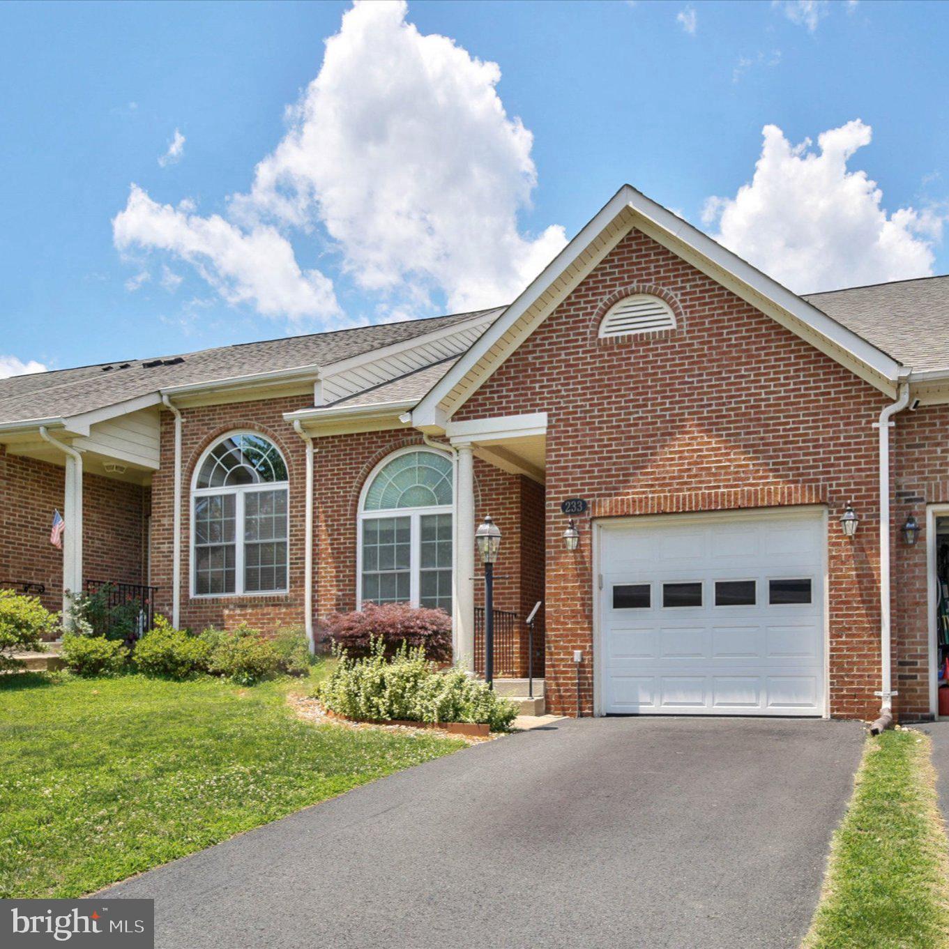 Not a 55 plus community!  Experience effortless main-level living at its finest! Nestled in the heart of Warrenton, this beautifully maintained townhome offers the perfect blend of accessibility and space. The main floor features two comfortable bedrooms and full bath. A garage ramp, makes it an ideal choice for anyone with mobility needs. You will love the full eat-in kitchen and the expansive, open-concept living and dining area. Downstairs, the fully finished lower level serves as a private secondary suite. Complete with a large living area, cozy gas fireplace, full bathroom, a den (perfect as an optional bedroom), and a fully equipped kitchenette, this space is ideal for an older child, roommate, or live-in caregiver. Got stuff? We have storage! The large storage area means you can take it with you! Step outside to enjoy a fully fenced backyard and a spacious deck, perfect for relaxing or entertaining guests. Updates include a newer roof, water heater, some appliances, driveway, and HVAC. Call today to see today!