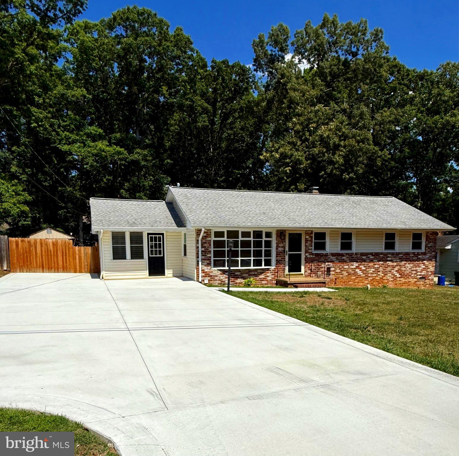This 3 bedroom brick-front rambler (approximately 1,690 sq. ft. living space) is situated on a quiet cul-de-sac street with large fenced backyard, including 2 storage buildings (1 with electricity),  huge concrete driveway, new double pane windows.  This home is located near Ferry Farm Elementary School (3-minute walk).  FEATURES:  Family room with brick fireplace, living room, walk-up attic (pull-down steps), upgraded granite countertops and stainless steel appliances, freshly painted interior, wood flooring throughout (most rooms), newer HVAC and roof. So much potential for expansion in this one level living home. SPECIAL FEATURE:  Electrical system is setup for whole-house generator.