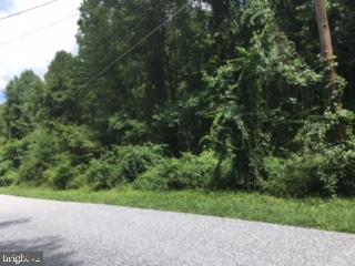 NOW is your chance to build your dream home!  The one with the picture windows looking out onto the stream! This 2.87 acre lot has so much potential to give you a private wooded charmer you've always wanted with plenty of land to spare!