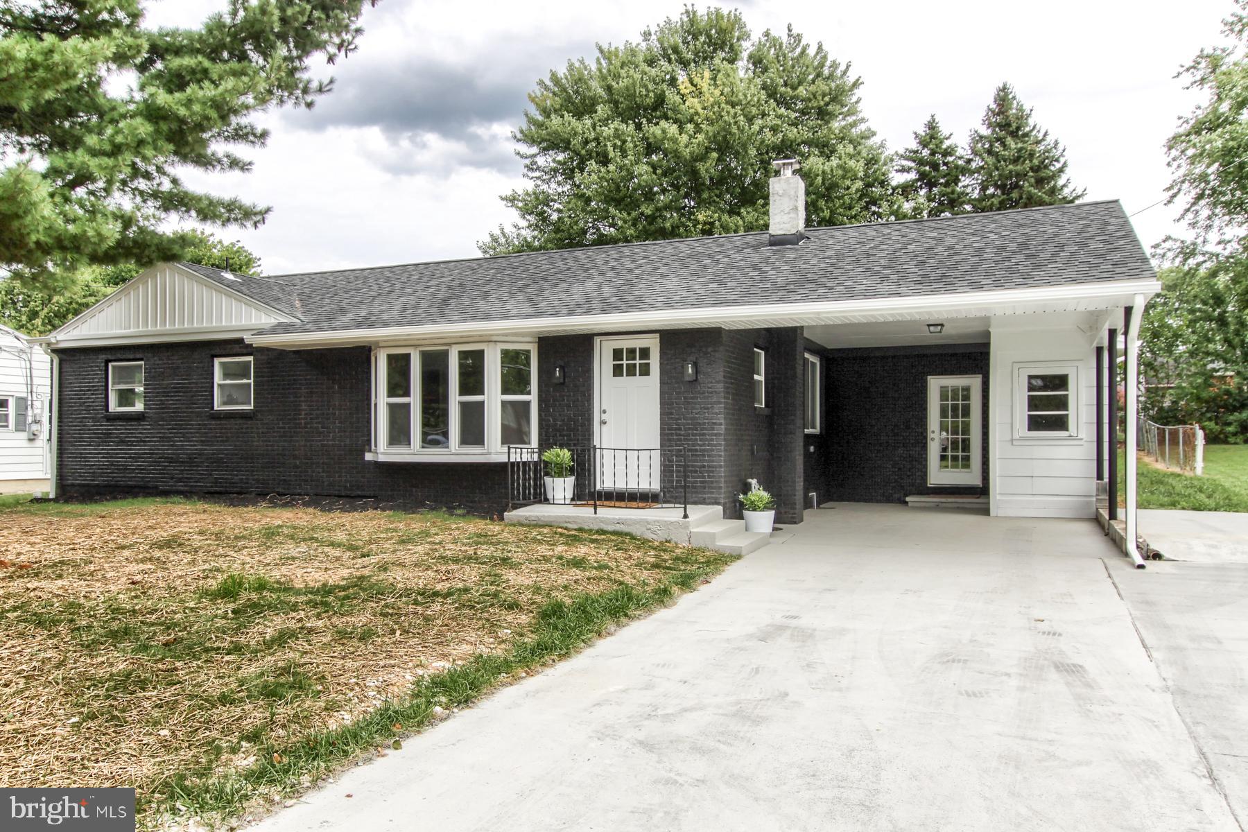 So much to appreciate in this newly updated home which has been completely renovated and is located in the Cumberland Valley School District.  Take time to reflect in the serenity of the primary living room. The newly update kitchen offers white cabinets, granite countertops with tile backsplash, an island with seating, and includes a new stove, microwave and dishwasher. A powder room is located adjacent to the kitchen. Entertain family and friends in the formal dining room enhanced with wainscoting. The family room is graced with a brick wall which hosts a fireplace for those chilly winter nights.  Exposed beams add an element of additional charm!    Enjoy your morning coffee or afternoon tea in the enclosed sunroom just off the kitchen.  Easy care laminate flooring has been installed in the main living area.  The balance of the home offers 3 bedrooms and 2 full baths.  Plush carpeting has been installed in each of the bedrooms.  The bathrooms all offer tile flooring along with new sinks, shower or tub and faucets.  New light fixtures have been mounted throughout the home.  Be sure to take a look at this new listing!