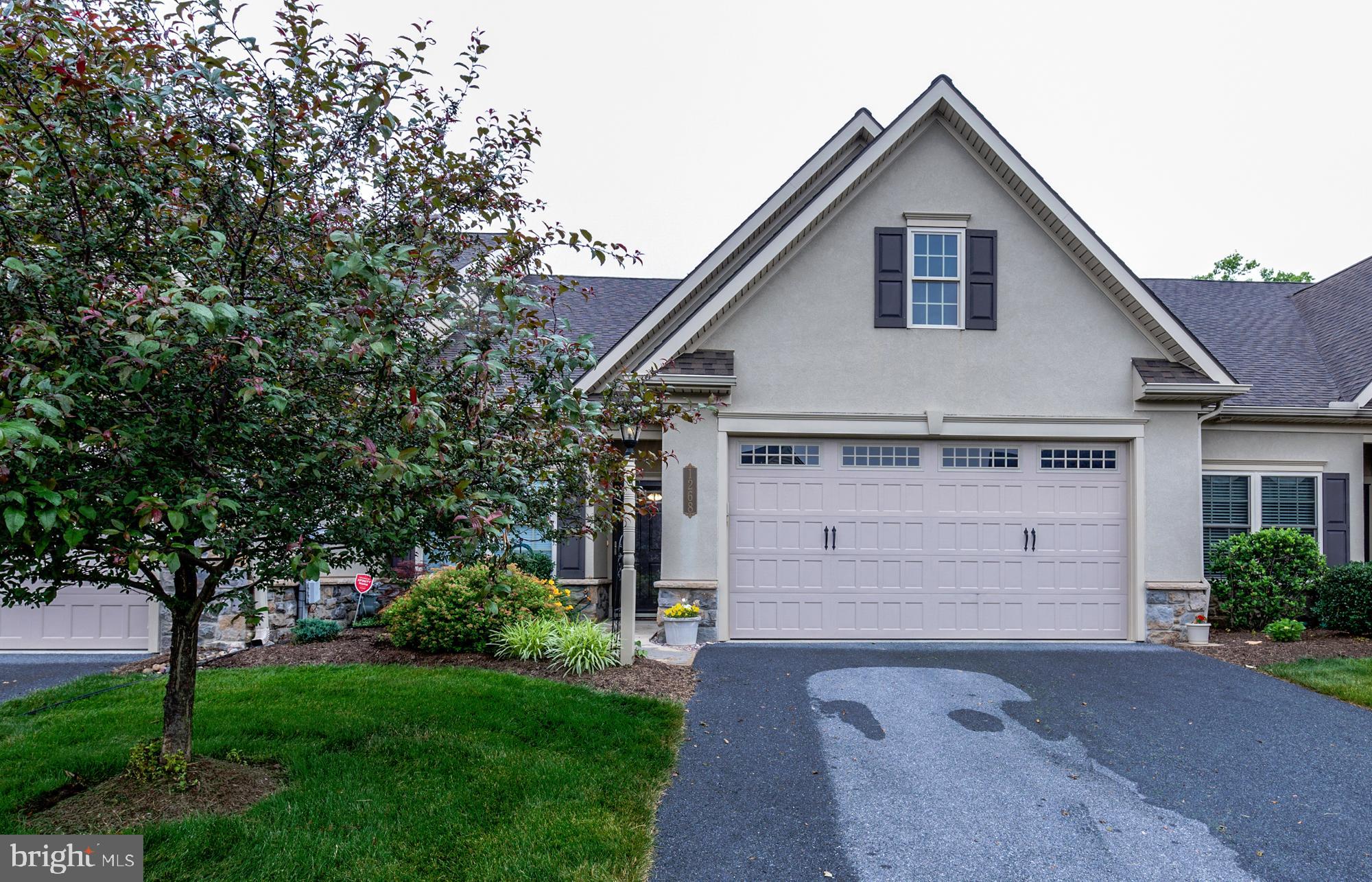 This home offers a lot of charm and character, very sophisticated taste! Open concept with large great room, 9' ceilings, tray ceiling. lovely kitchen with large island, black stainless steel appliances, professionally faux painted backsplash, 1st floor master bedroom and bathroom, tray ceiling, and bath with walk-in shower. 2nd bedroom and large loft on 2nd floor. Home has a reverse osmosis system for drinking water at faucet and thru fridge. Flooring throughout laminate and Coretek (a high quality laminate).