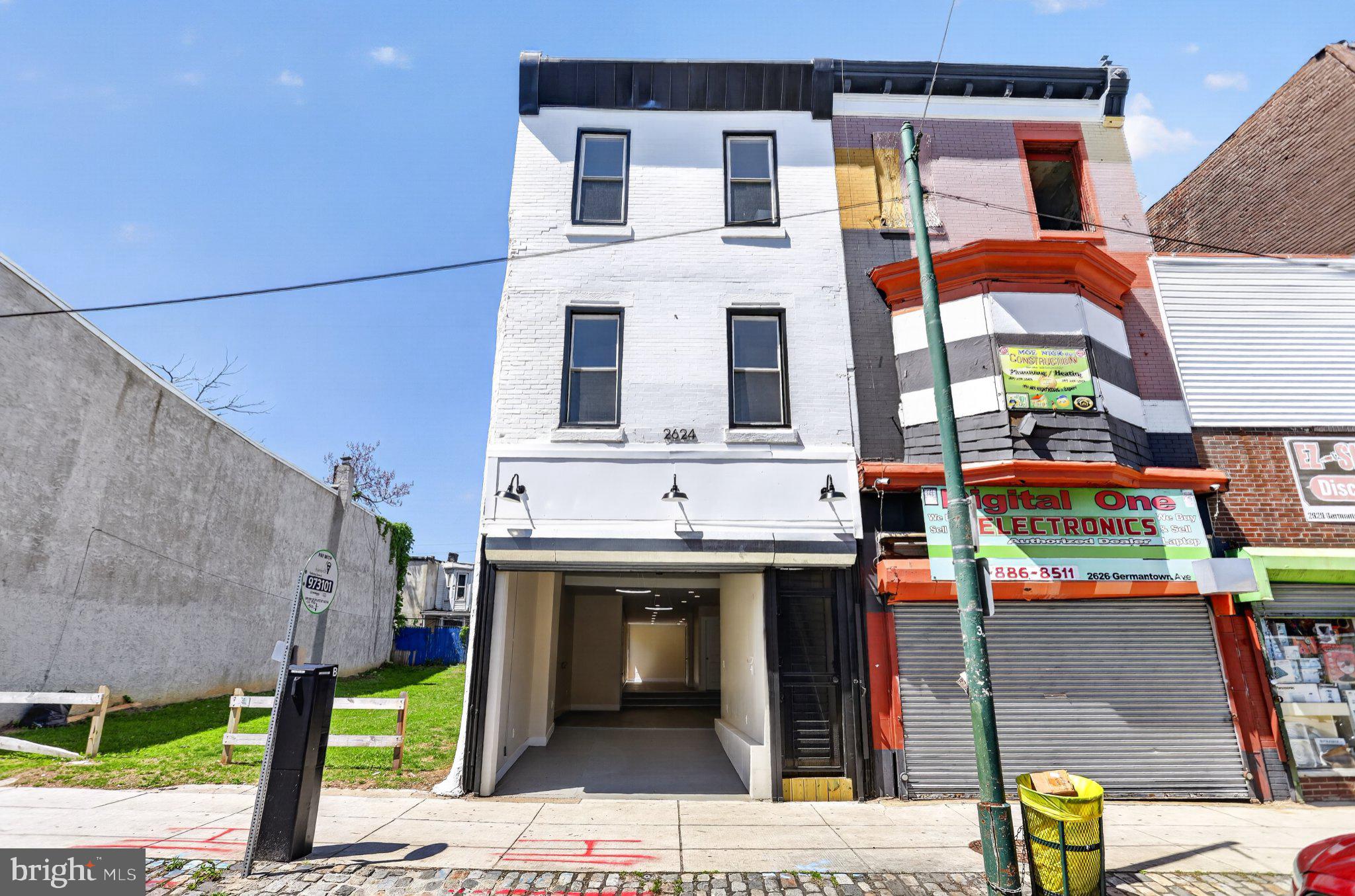 Fully rehabbed from top to bottom, 2624 Germantown Ave is a rare mixed-use property that delivers income potential, operational flexibility, and immediate livability in one turnkey package. Whether you're an investor, an owner-operator, or someone looking to do both, this building was built for you.

The ground floor commercial space is wide open and ready for your vision. With two full bathrooms, a private outdoor area, and access to a clean, spacious basement, the space is well-suited for a storefront, boutique office, creative studio, wellness practice, or service-based business. The layout gives you real options, and the condition means you can focus on building your business rather than finishing someone else's renovation.

Upstairs, three fully furnished efficiency apartments each feature a private full bathroom and thoughtful finishes throughout. All furniture is included in the sale, so each unit is genuinely move-in or rent-ready from the moment you close. For an investor, that means income without delay. For an owner-occupant, it means flexibility to live in one unit while the others work for you.

Every system in this building has been updated as part of a comprehensive, high-quality rehab. The craftsmanship is evident throughout, and the attention to detail sets this property apart from the typical mixed-use flip. This is not a cosmetic renovation. It was done right.

Situated on Germantown Avenue, one of Philadelphia's most historically significant and actively invested corridors, this property benefits from strong pedestrian foot traffic, multiple transit options, and a neighborhood that continues to attract community investment and new energy. The location supports both a thriving commercial tenant and residential renters who want walkability and connectivity.
The opportunity here is genuine. Run your business from the ground floor while collecting rent from three units above. Lease all four spaces and build steady, diversified cash flow. Or simply secure a well-positioned asset on one of the city's most storied avenues. However you approach it, 2624 Germantown Ave is ready to deliver. Schedule your showing today.